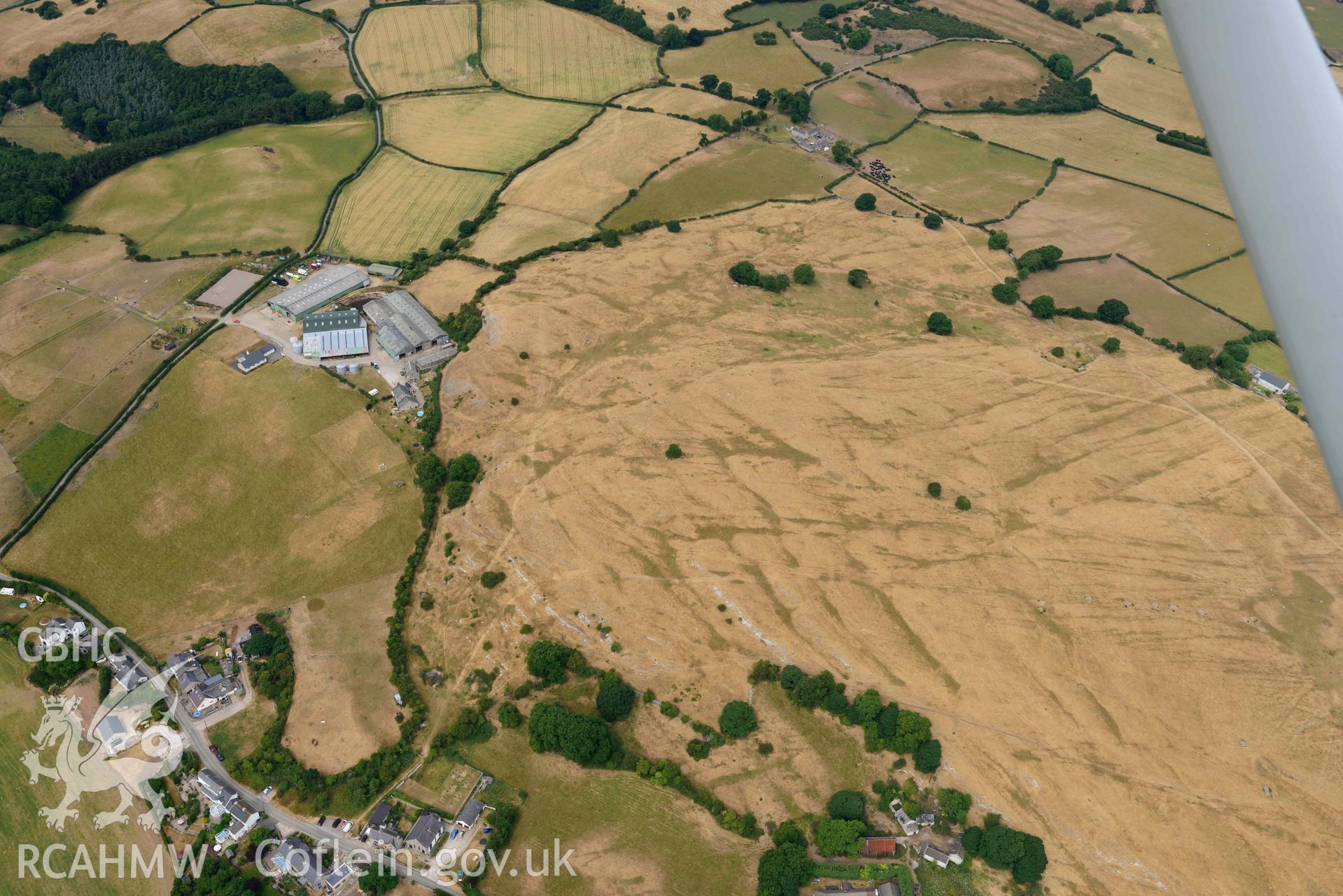 Marian Ffrith enclosure. Oblique aerial photograph taken during the Royal Commission’s programme of archaeological aerial reconnaissance by Toby Driver on 10 July 2018.