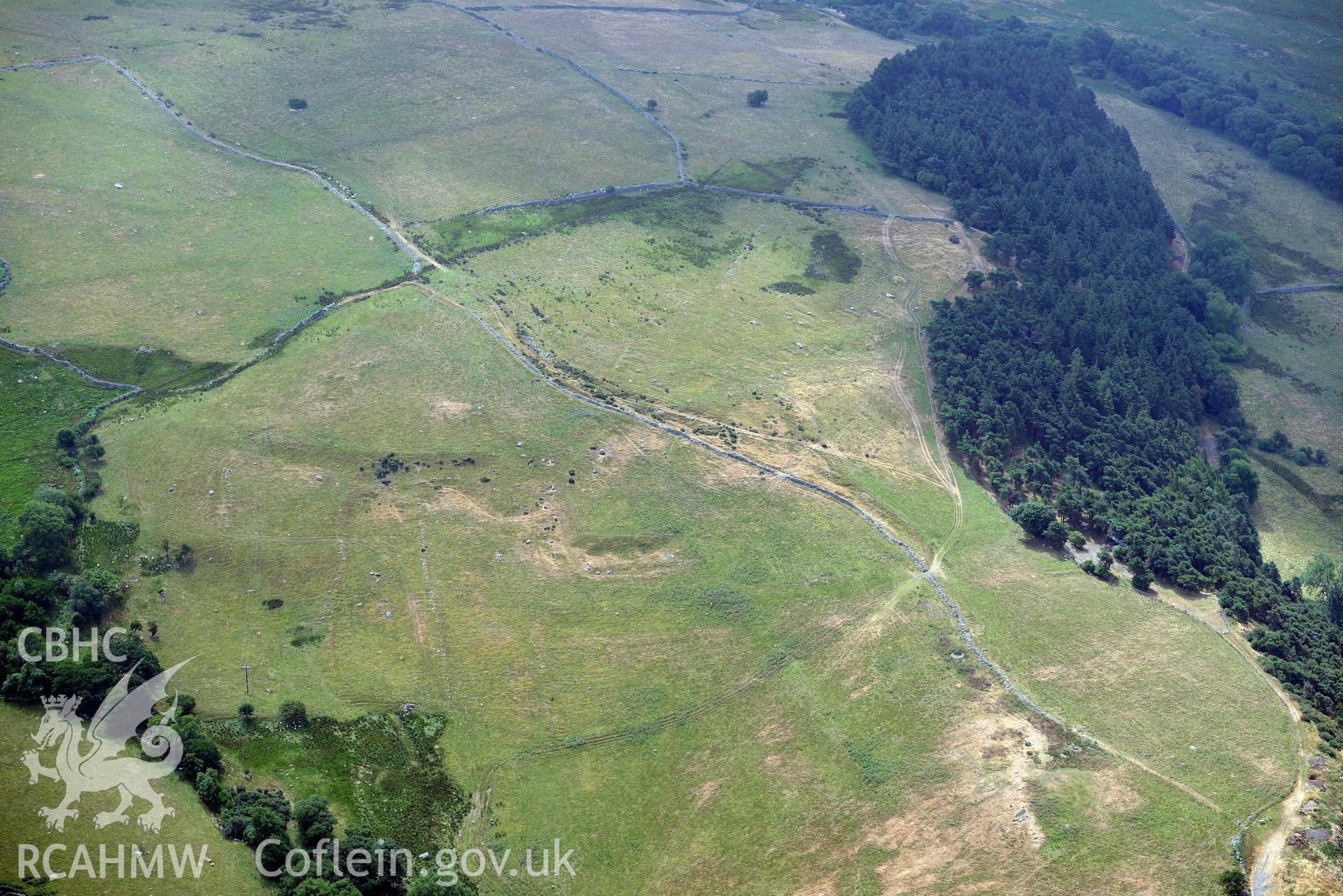 Caer Haidd field system. Oblique aerial photograph taken during the Royal Commission’s programme of archaeological aerial reconnaissance by Toby Driver on 10 July 2018.