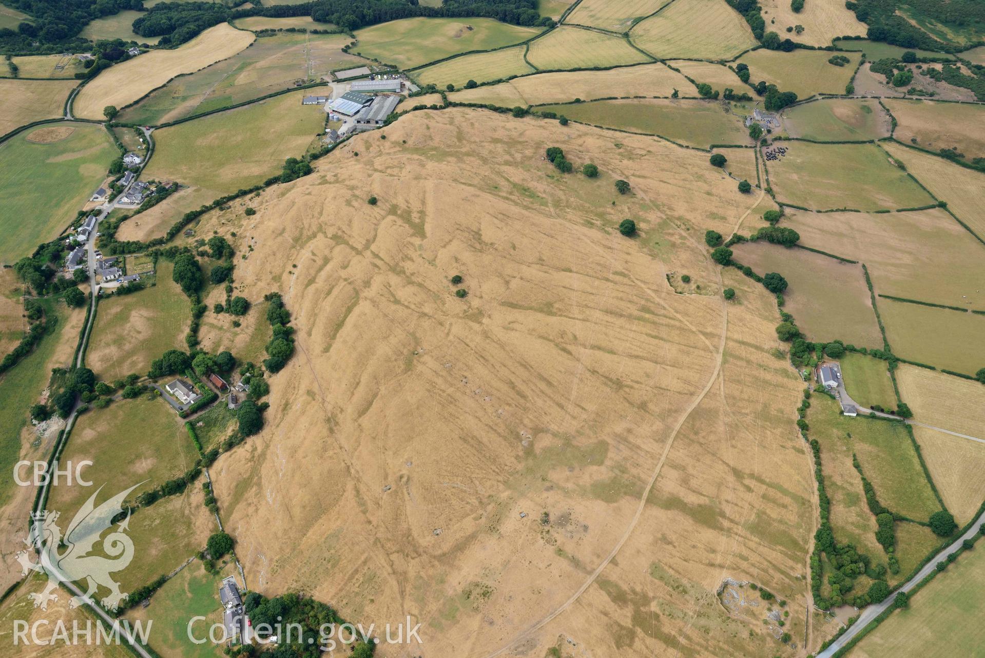 Marian Ffrith enclosure. Oblique aerial photograph taken during the Royal Commission’s programme of archaeological aerial reconnaissance by Toby Driver on 10 July 2018.