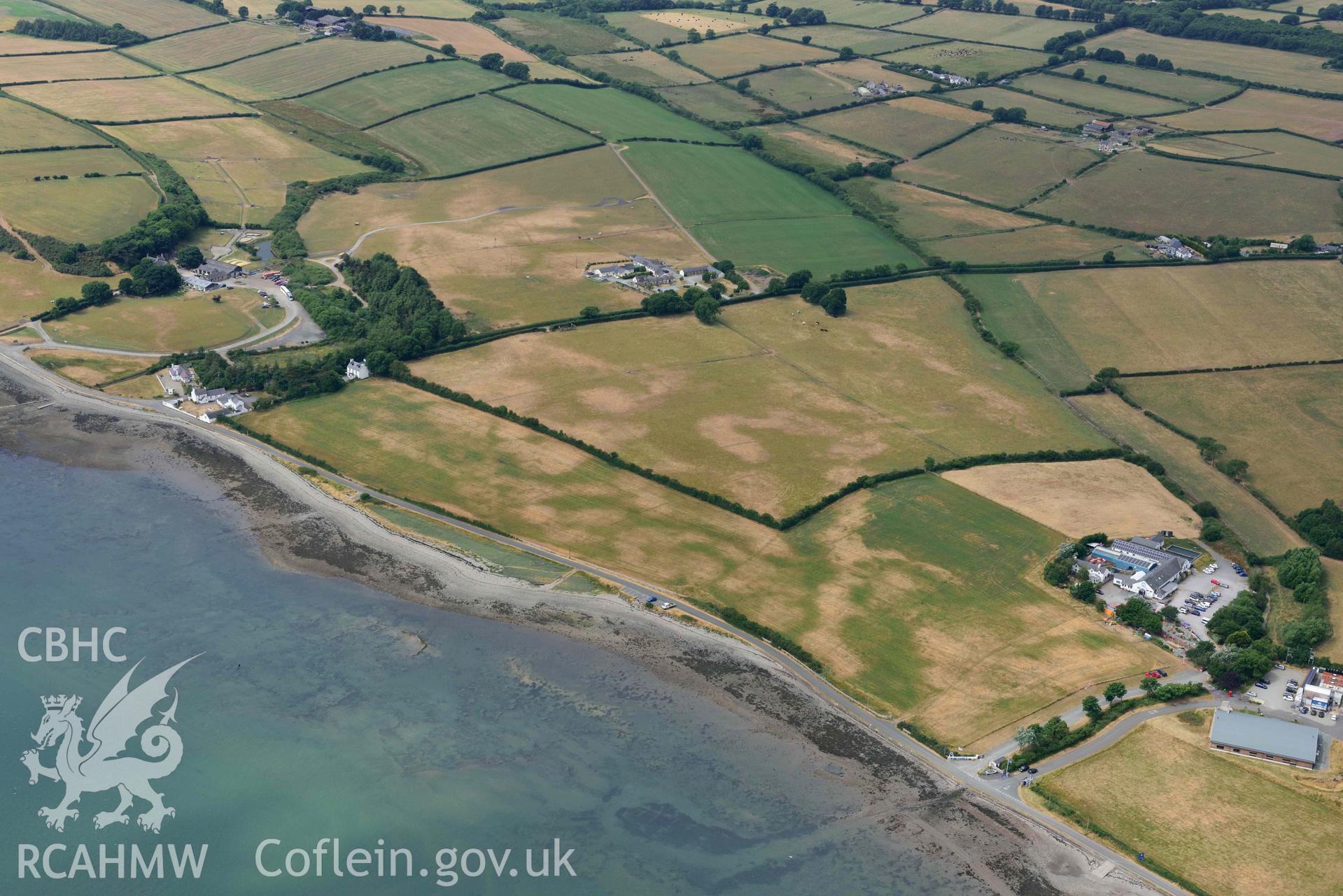 Plas Farm early field systems. Oblique aerial photograph taken during the Royal Commission’s programme of archaeological aerial reconnaissance by Toby Driver on 10 July 2018.