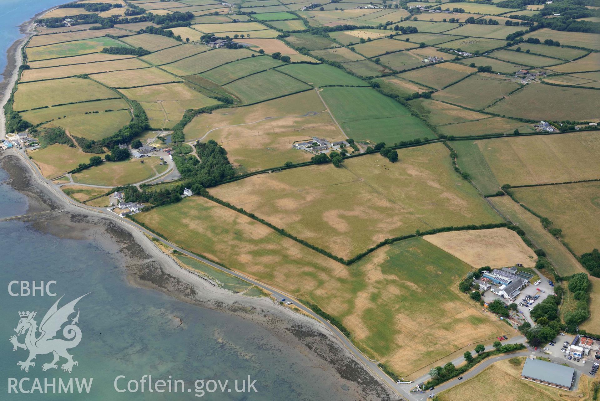 Plas Farm early field systems. Oblique aerial photograph taken during the Royal Commission’s programme of archaeological aerial reconnaissance by Toby Driver on 10 July 2018.