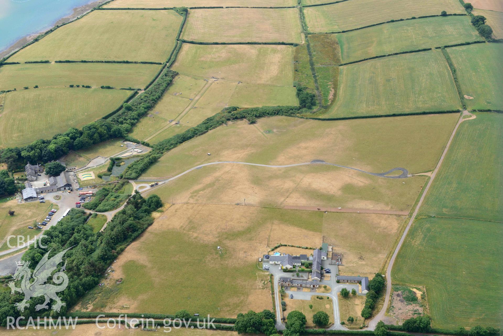 Plas Farm early field systems. Oblique aerial photograph taken during the Royal Commission’s programme of archaeological aerial reconnaissance by Toby Driver on 10 July 2018.