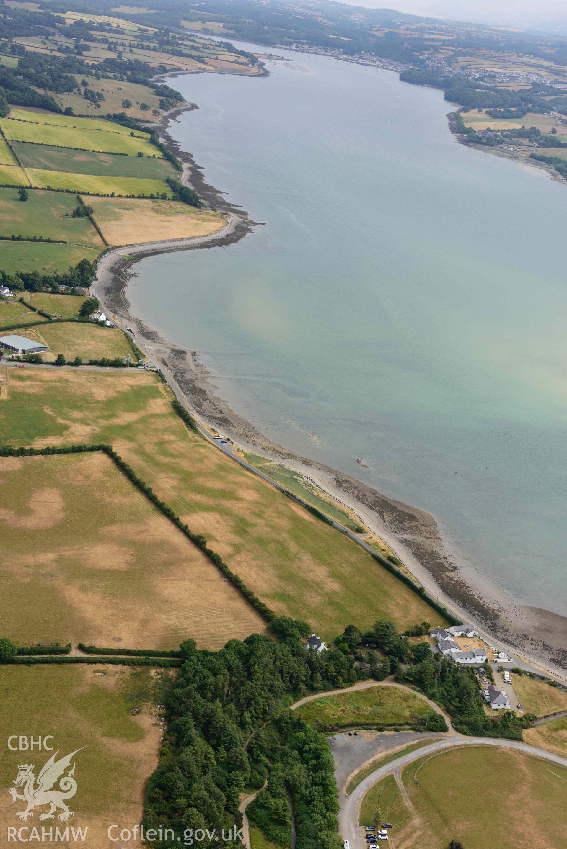 Plas Farm early field systems. Oblique aerial photograph taken during the Royal Commission’s programme of archaeological aerial reconnaissance by Toby Driver on 10 July 2018.