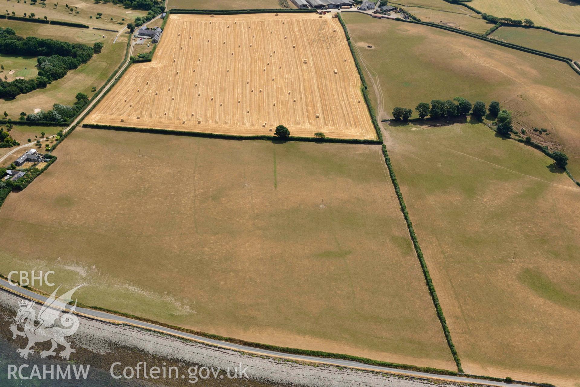 Plas Farm early field systems. Oblique aerial photograph taken during the Royal Commission’s programme of archaeological aerial reconnaissance by Toby Driver on 10 July 2018.