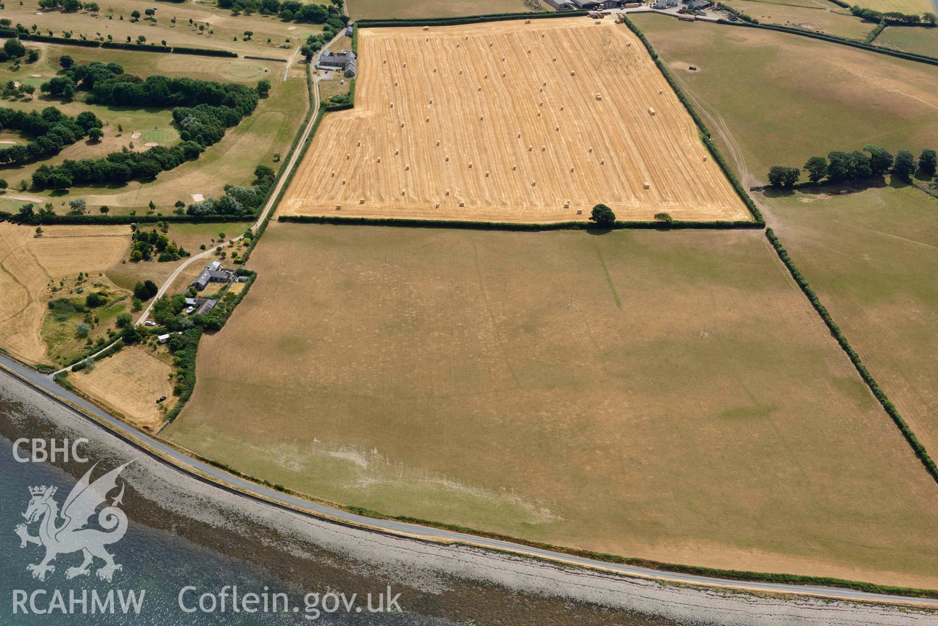 Plas Farm early field systems. Oblique aerial photograph taken during the Royal Commission’s programme of archaeological aerial reconnaissance by Toby Driver on 10 July 2018.