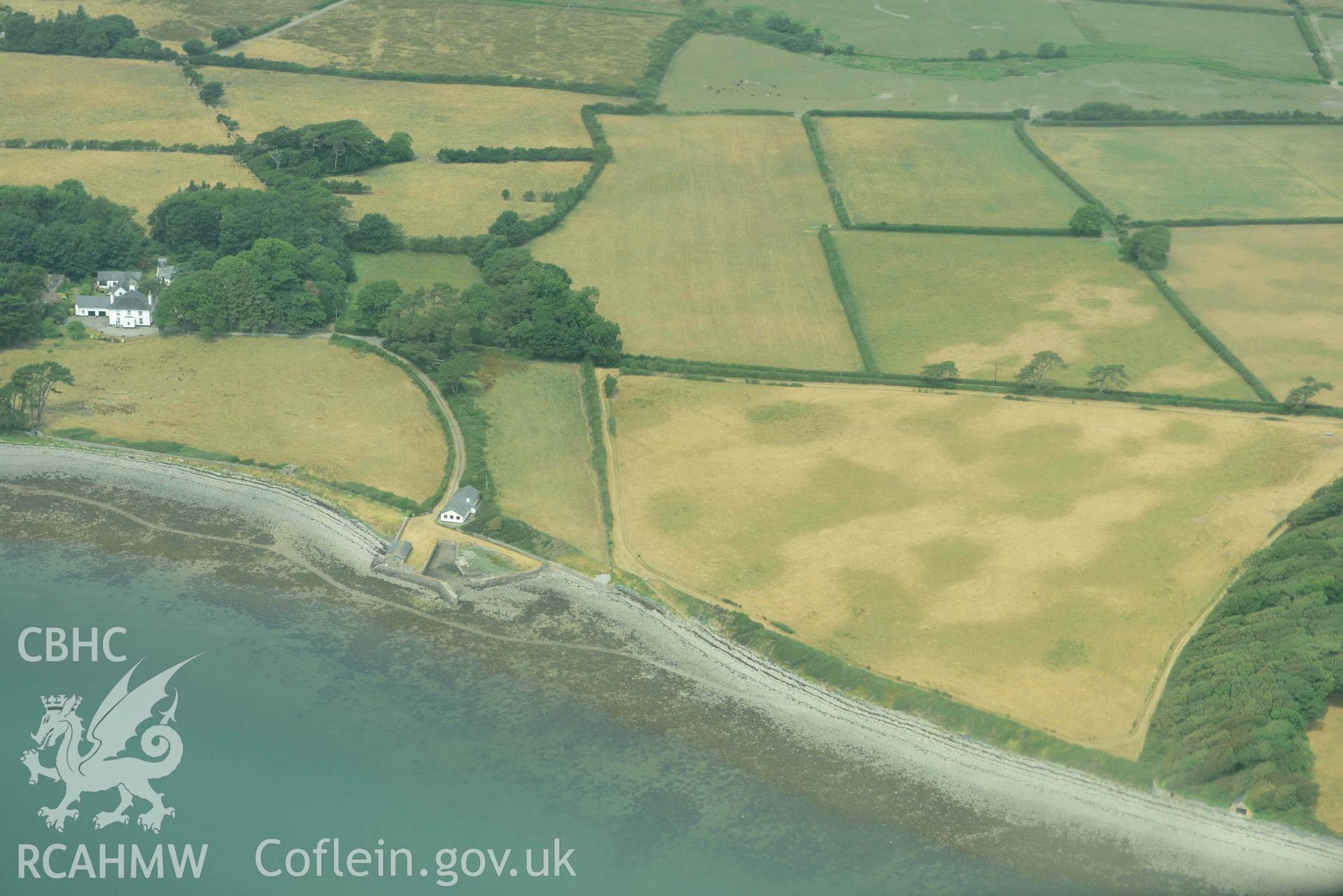 Plas Farm early field systems. Oblique aerial photograph taken during the Royal Commission’s programme of archaeological aerial reconnaissance by Toby Driver on 10 July 2018.