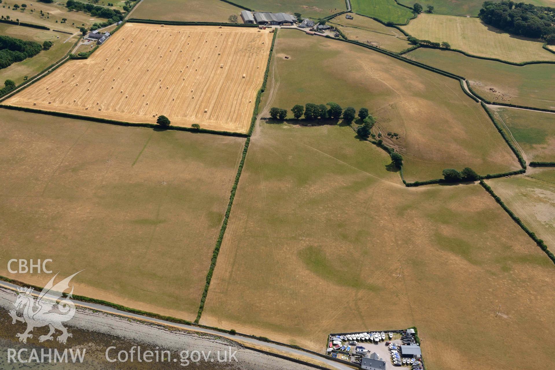 Plas Farm early field systems. Oblique aerial photograph taken during the Royal Commission’s programme of archaeological aerial reconnaissance by Toby Driver on 10 July 2018.