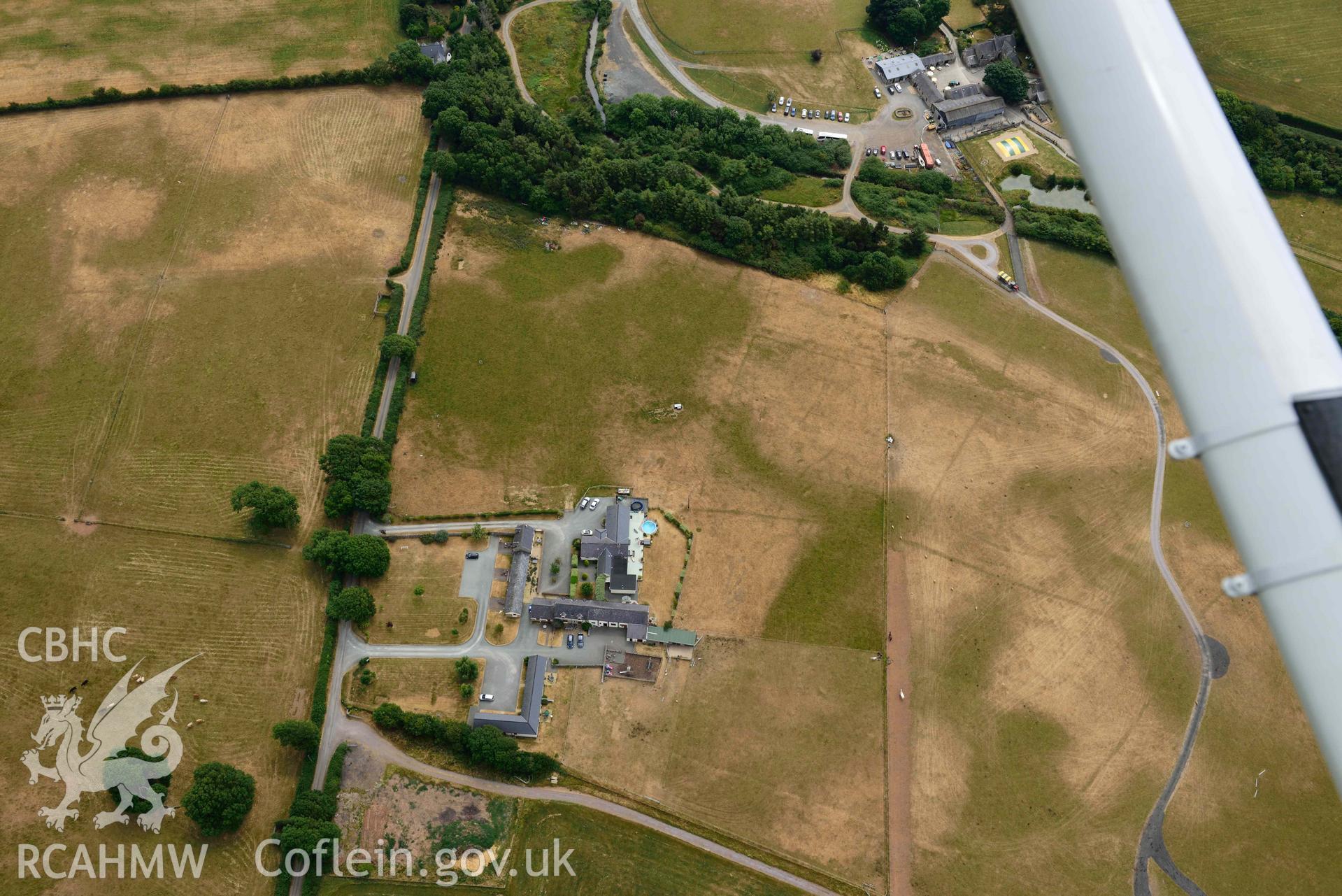 Plas Farm early field systems. Oblique aerial photograph taken during the Royal Commission’s programme of archaeological aerial reconnaissance by Toby Driver on 10 July 2018.