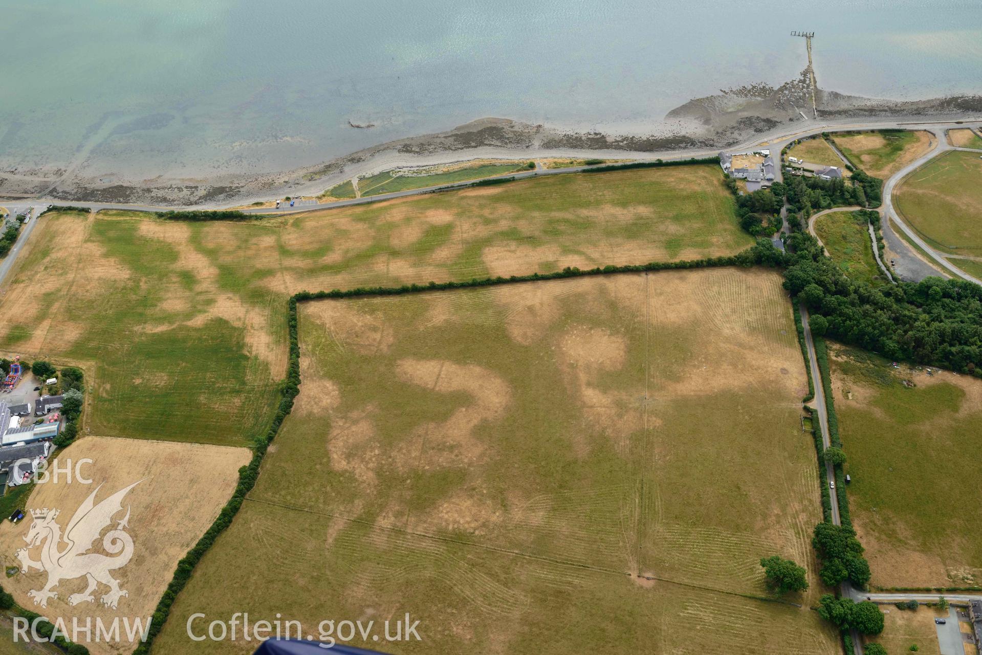 Plas Farm early field systems. Oblique aerial photograph taken during the Royal Commission’s programme of archaeological aerial reconnaissance by Toby Driver on 10 July 2018.