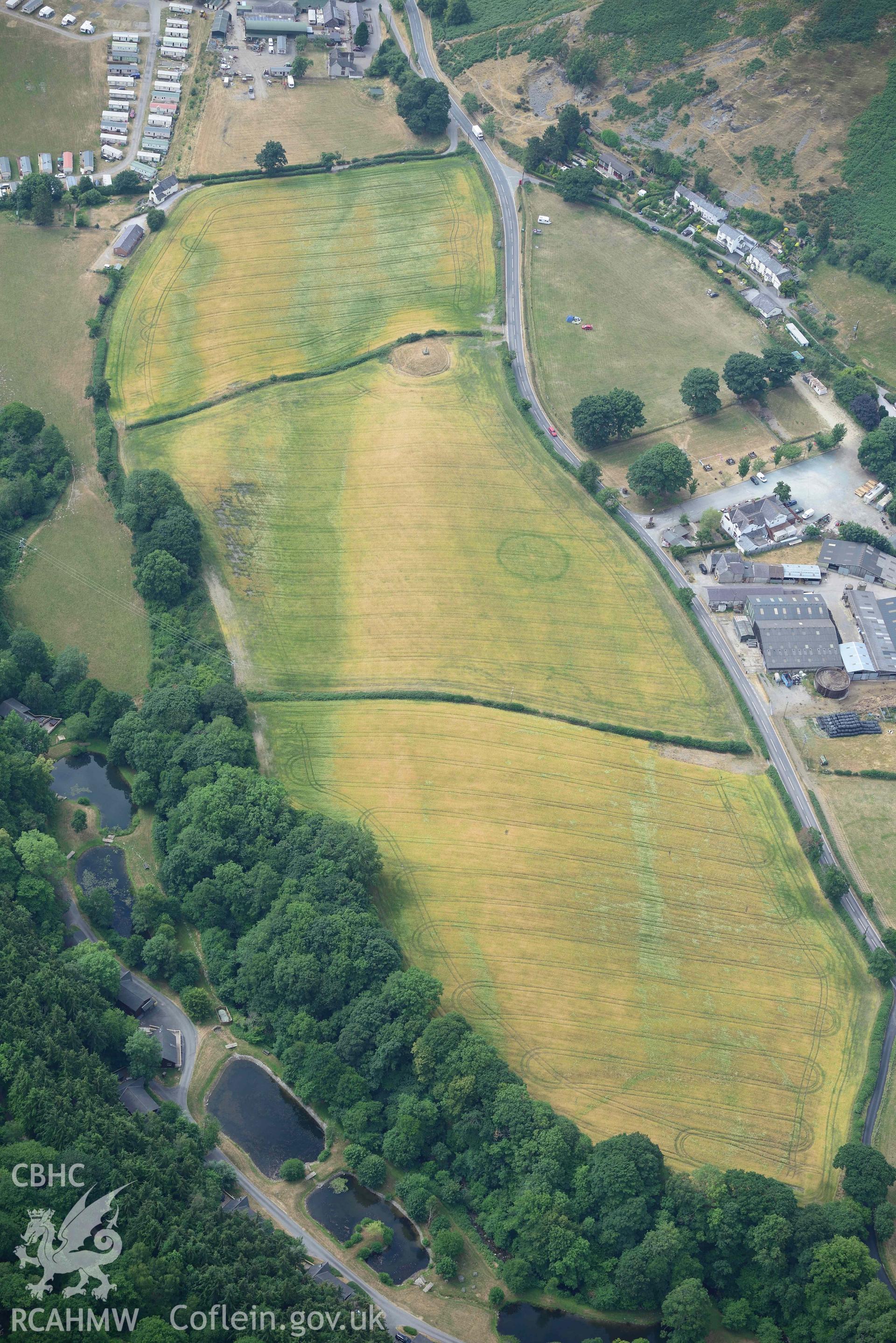 Maes y Llyn defended enclosure, Pillar of Eliseg and Eliseg Ring Ditch. Oblique aerial photograph taken during the Royal Commission’s programme of archaeological aerial reconnaissance by Toby Driver on 10 July 2018.