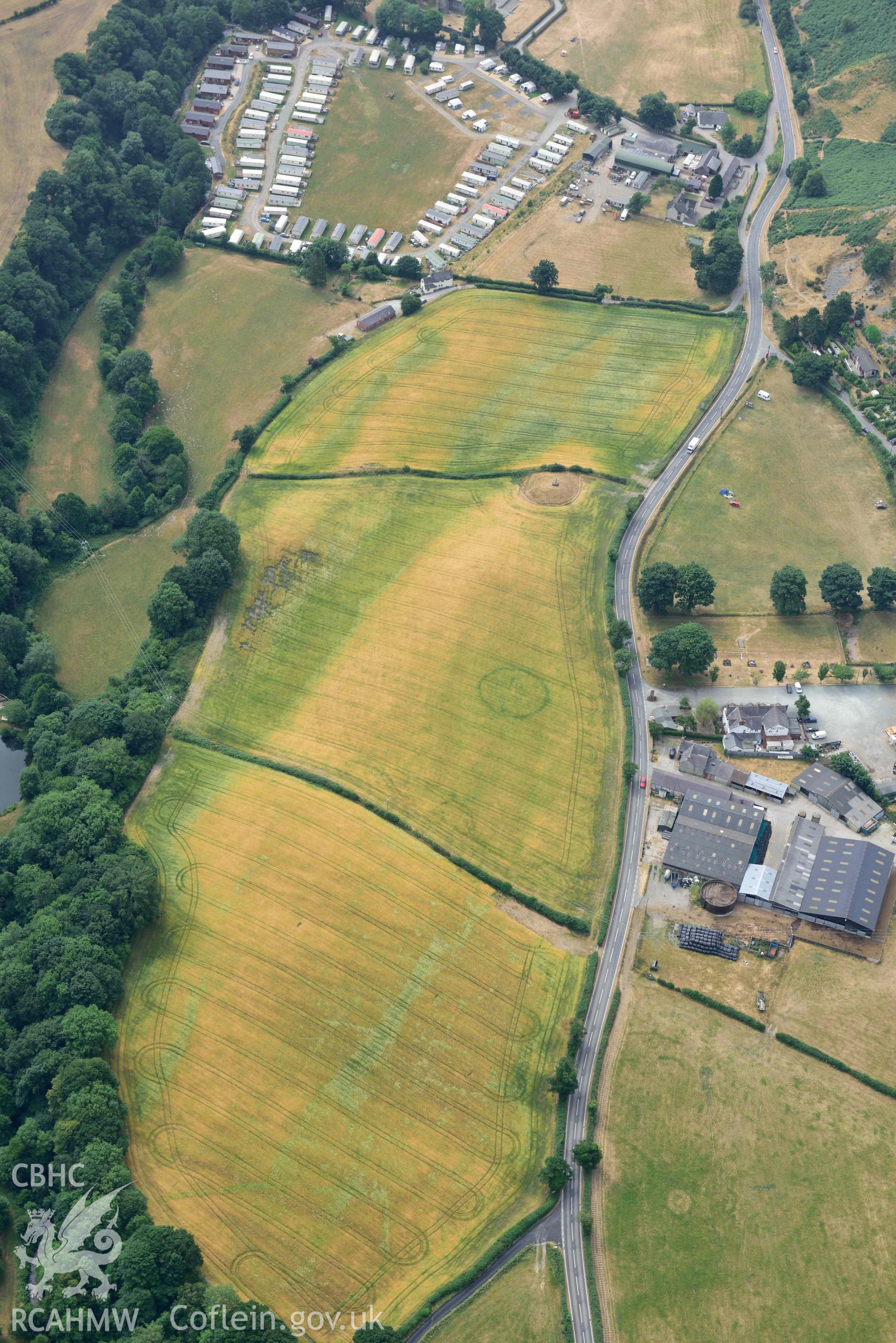 Maes y Llyn defended enclosure, Pillar of Eliseg and Eliseg Ring Ditch. Oblique aerial photograph taken during the Royal Commission’s programme of archaeological aerial reconnaissance by Toby Driver on 10 July 2018.