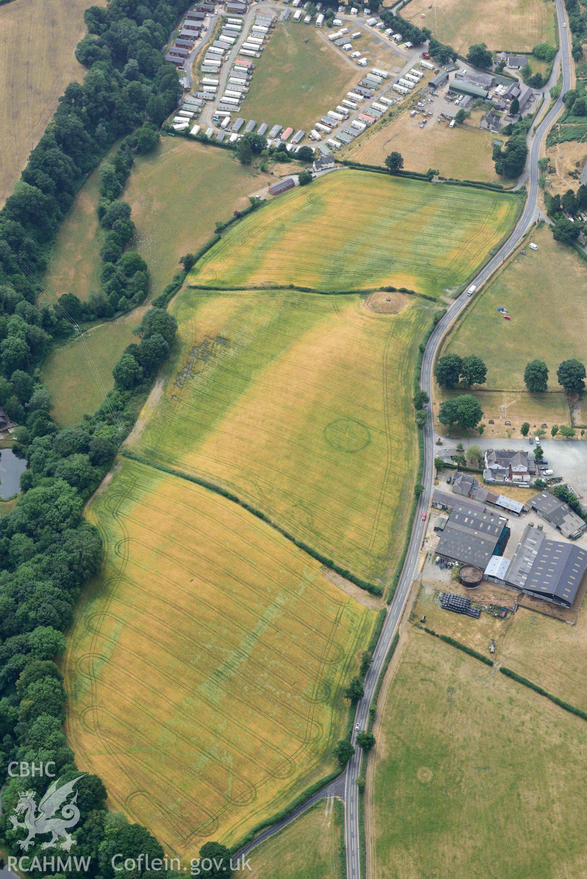 Maes y Llyn defended enclosure, Pillar of Eliseg and Eliseg Ring Ditch. Oblique aerial photograph taken during the Royal Commission’s programme of archaeological aerial reconnaissance by Toby Driver on 10 July 2018.