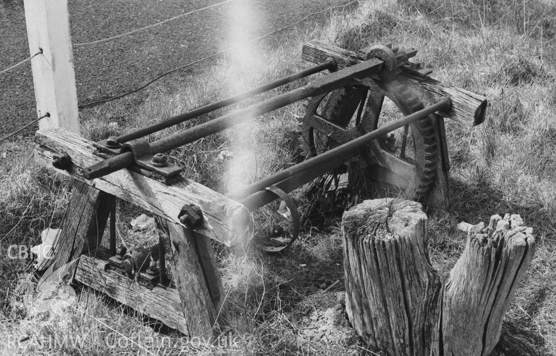 Digital copy of a black and white negative showing detailed view of remains of cable car winches at Aberaeron harbour. Photographed by Arthur Chater on 3 April 1969. Looking north from Grid Reference SN 4559 6285.