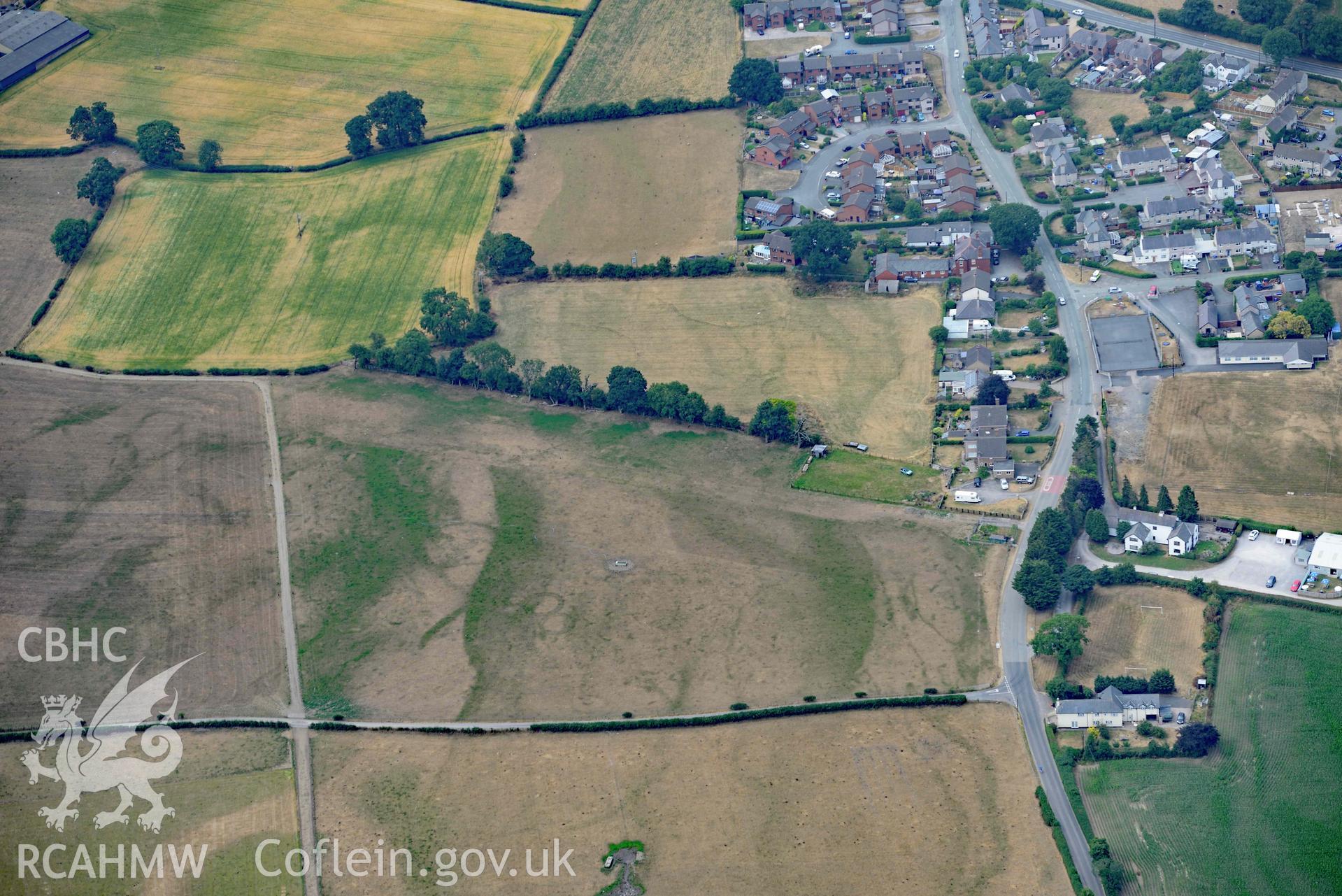 Rhewl round barrows complex. Oblique aerial photograph taken during the Royal Commission’s programme of archaeological aerial reconnaissance by Toby Driver on 10 July 2018.