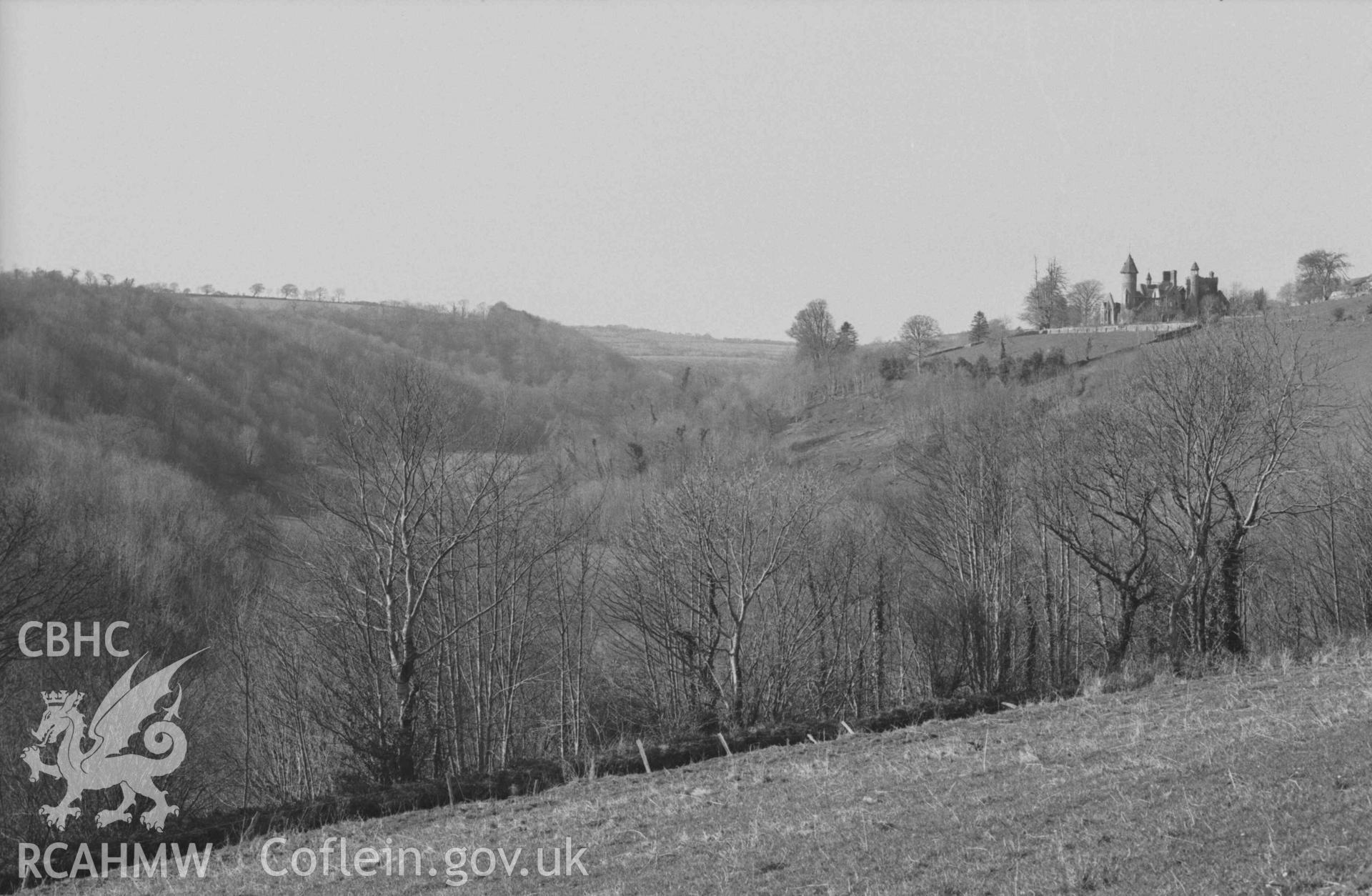 Digital copy of a black and white negative showing Nant Gwylan and the ruins of Bronwydd, from just above Bronwydd Lodge. Photographed by Arthur Chater on 5 April 1969. Looking north from Grid Reference SN 3543 4253.