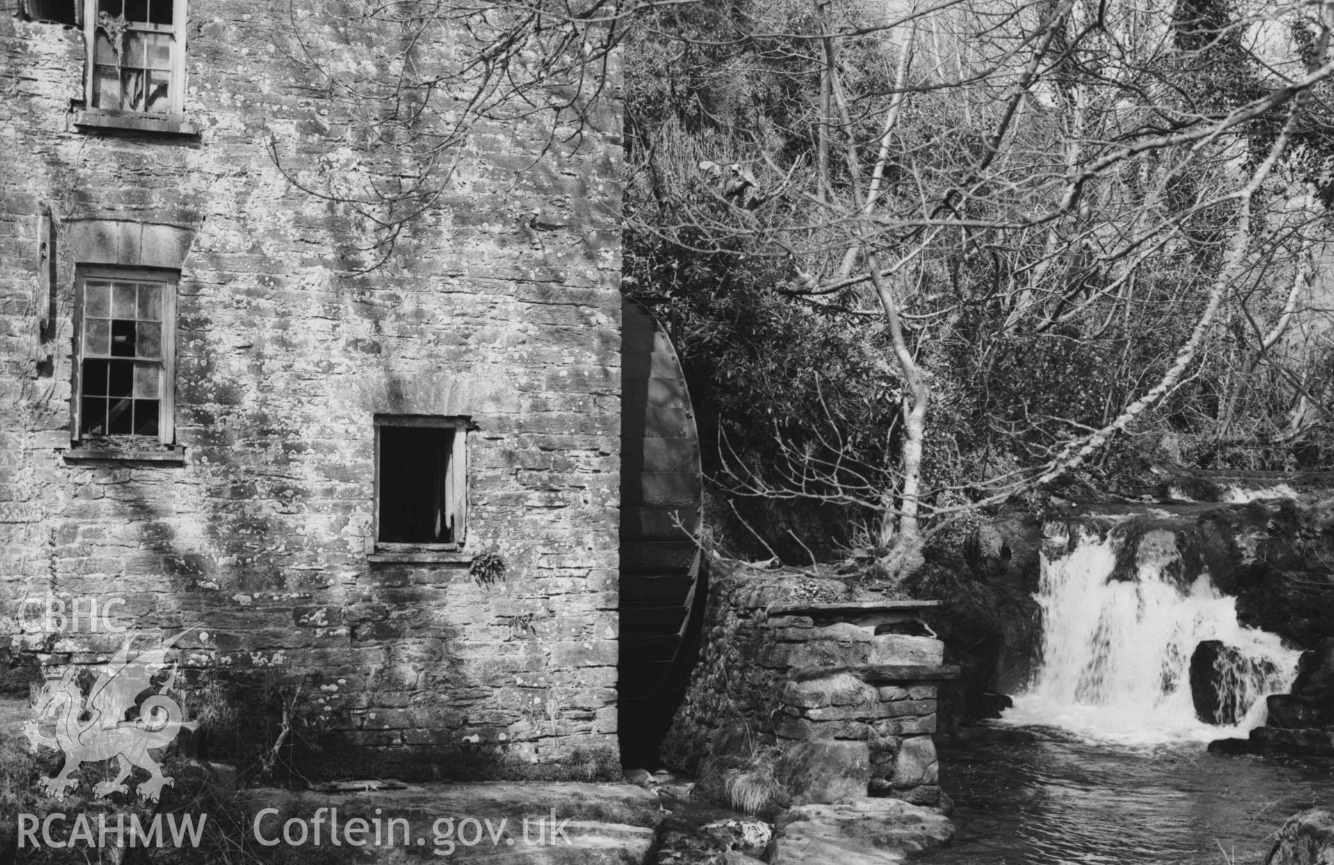 Digital copy of a black and white negative showing Felin-Wnda watermill; waterfall on the Afon Ceri on the right. Photographed by Arthur Chater on 7 April 1969. Looking north from Grid Reference SN 3235 4690.