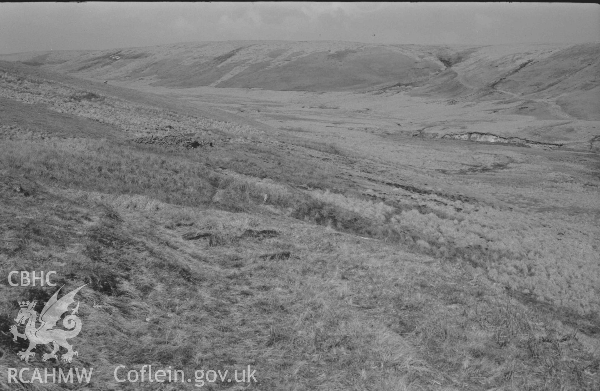 Digital copy of a black and white negative showing view along the old road to Hengae ruin and Rhyd Hengae. Photographed by Arthur Chater on 8 April 1969. Looking east north east from Grid Reference SN 8187 6790.