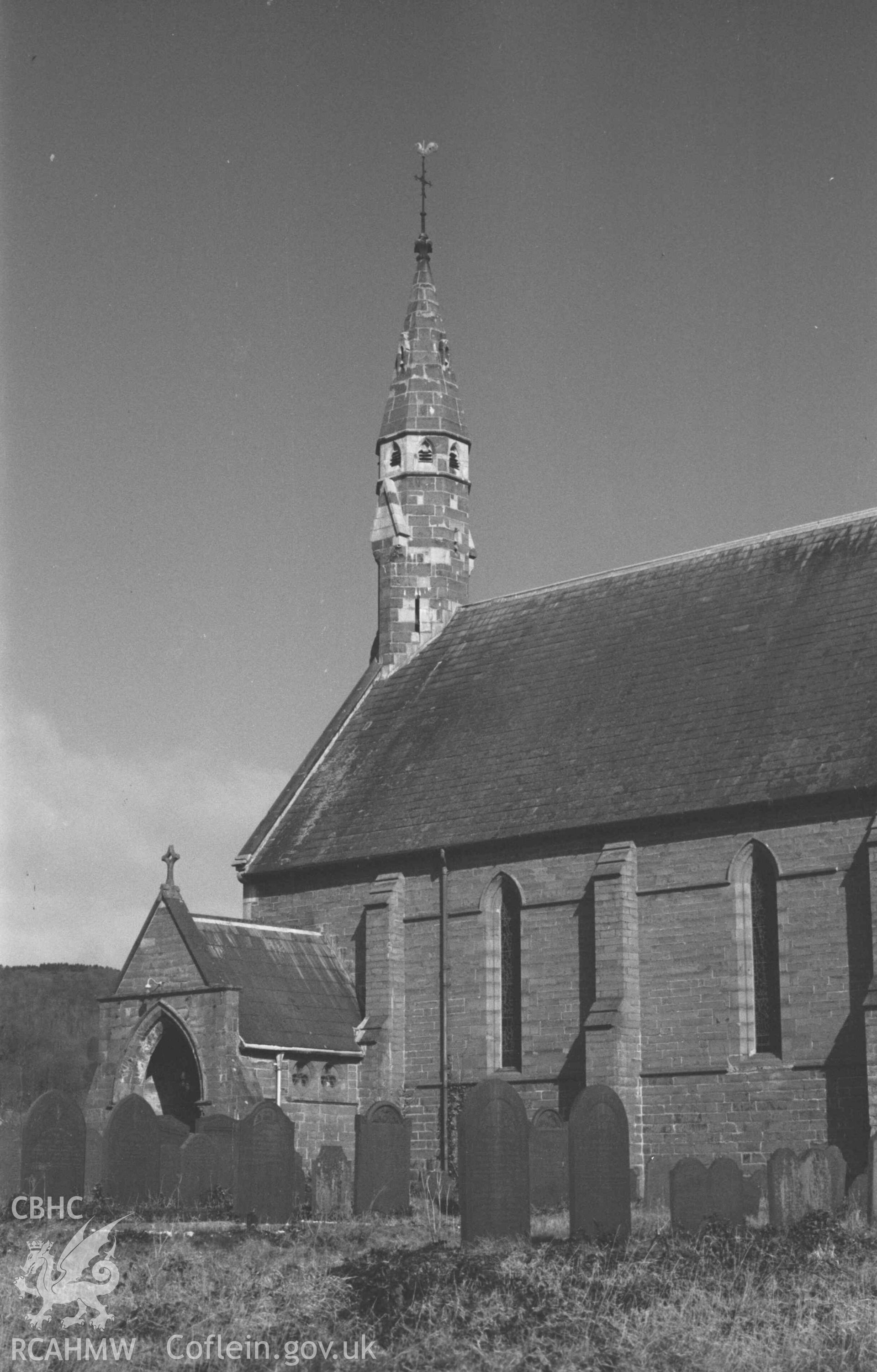 Digital copy of a black and white negative showing All Saints' Churchyard, Llangorwen. Photographed by Arthur Chater on 12 April 1969. Looking north west from Grid Reference SN 6035 8380.