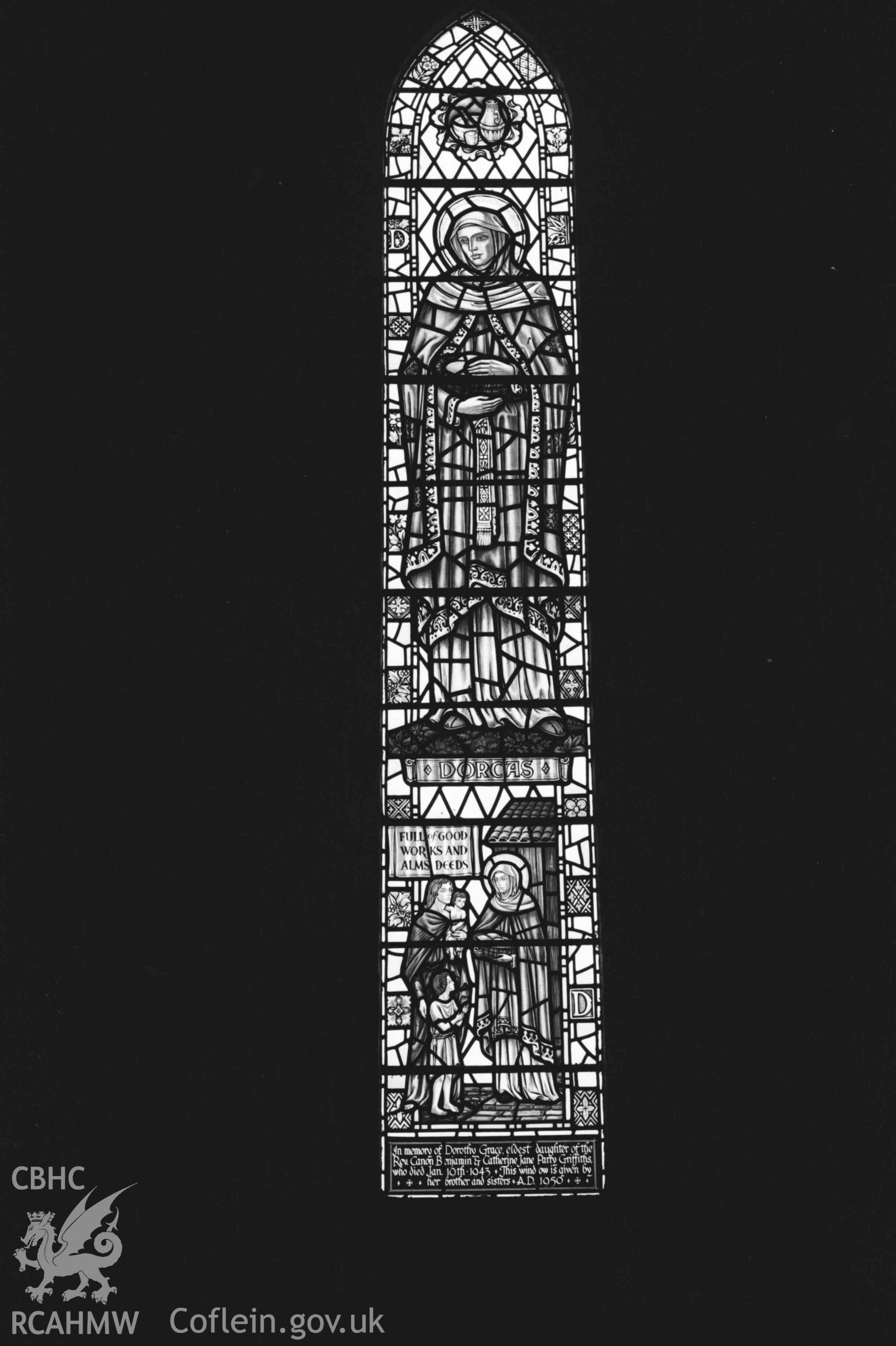 Digital copy of a black and white negative showing stained glass window in All Saints' Churchyard, Llangorwen. Photographed by Arthur Chater on 12 April 1969. Grid Reference SN 6033 8383.