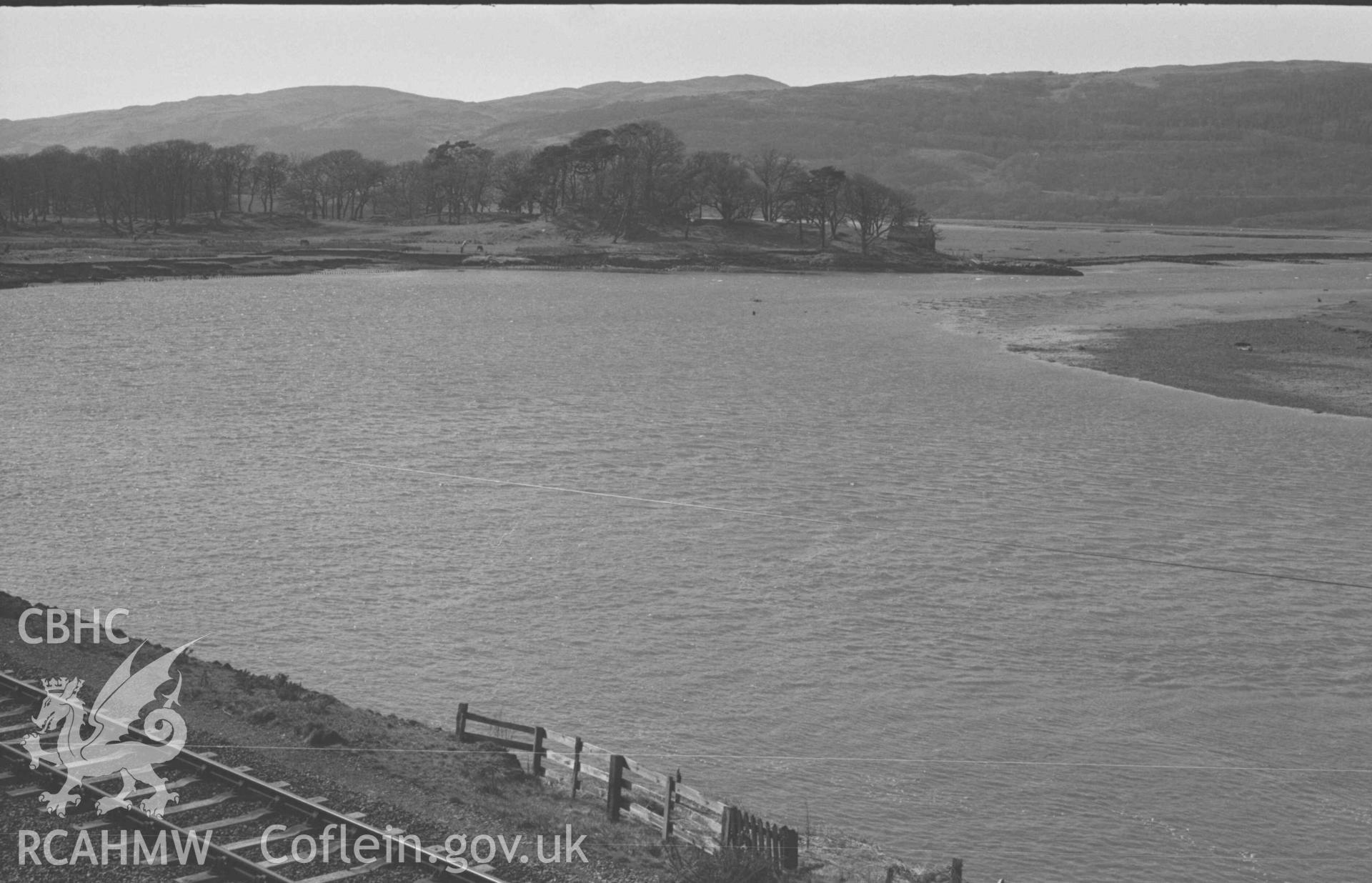 Digital copy of a black and white negative showing view down the Dyfi to Domen Las from the road below Glandyfi Castle. Photographed by Arthur Chater on 12 April 1969. Looking west north west from Grid Reference SN 6917 9675.