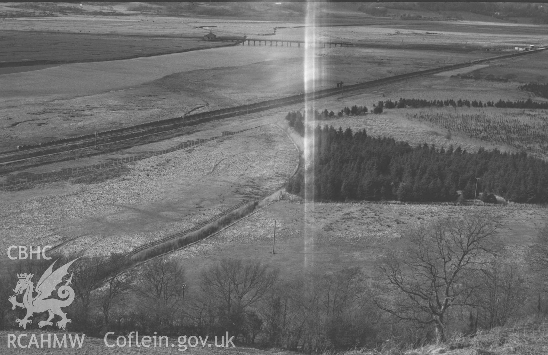 Digital copy of a black and white negative showing the Dyfi Junction viaduct on the Cambrian Coast railway. Photographed by Arthur Chater on 12 April 1969.