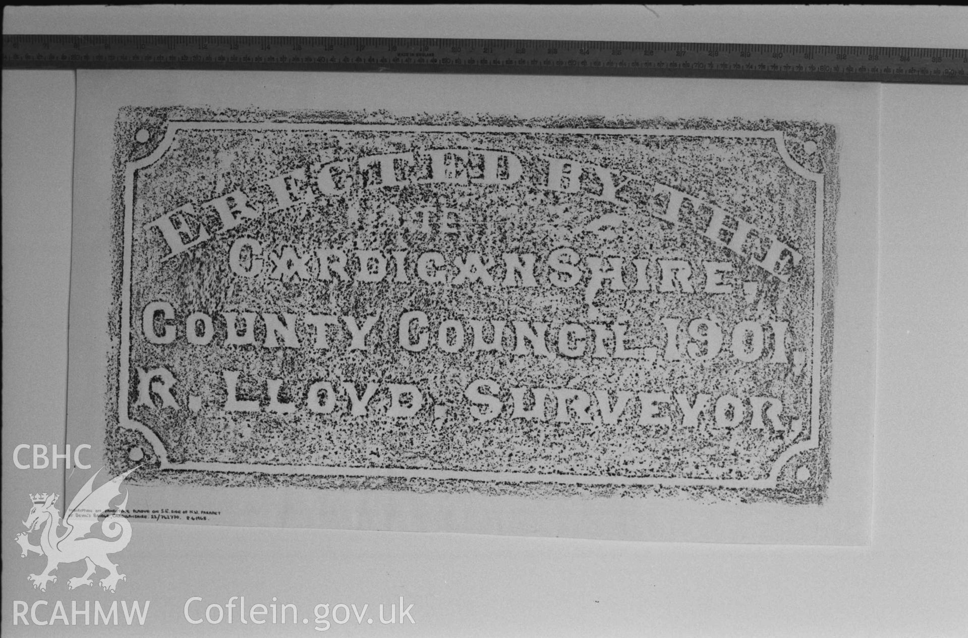 Digital copy of a black and white negative showing rubbing of plaque on Pontarfynach. Produced by Arthur Chater on 26 August 1969.