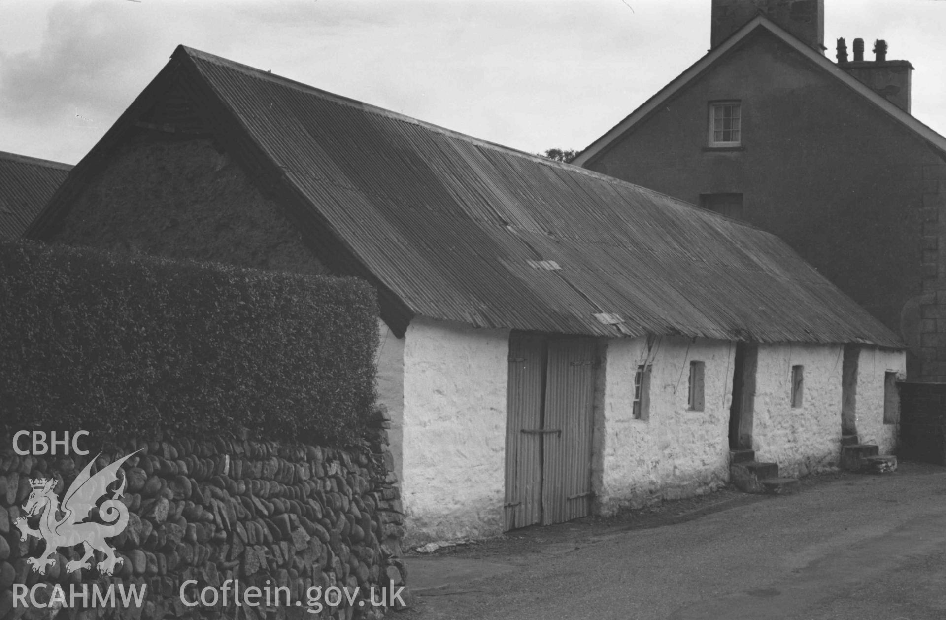 Digital copy of a black and white negative showing old cottages 50m south west of the crossroads at Caerwedros. Photographed by Arthur Chater on 28 August 1969, looking south west from Grid Reference SN 3761 5582.