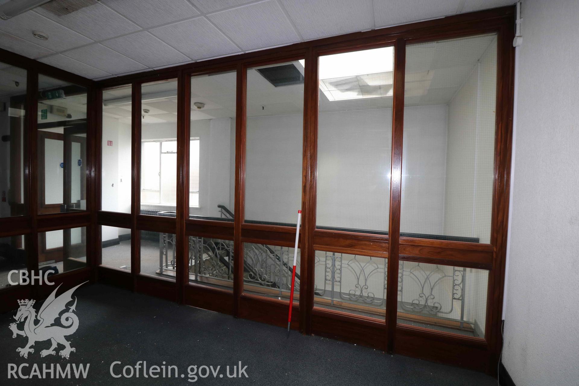 Photograph showing third floor lobby, from a Level 4 Historic Building Record of the former Howells Department Store, Cardiff. Conducted as a part of listed building consent by Purcell Architecture in 2024.