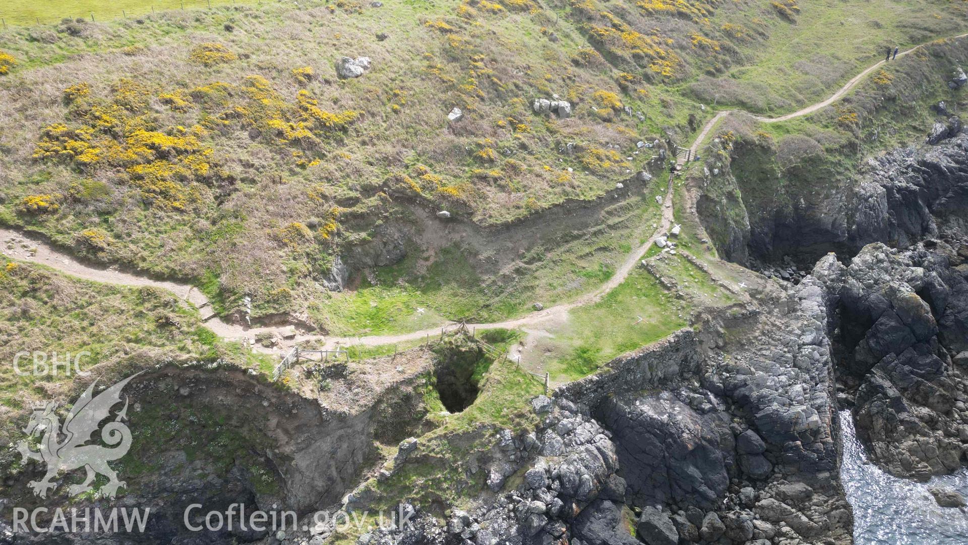Oblique view, looking southeast, of Penmaenmelyn copper mine on 24/04/2024. Scales are 1m.
