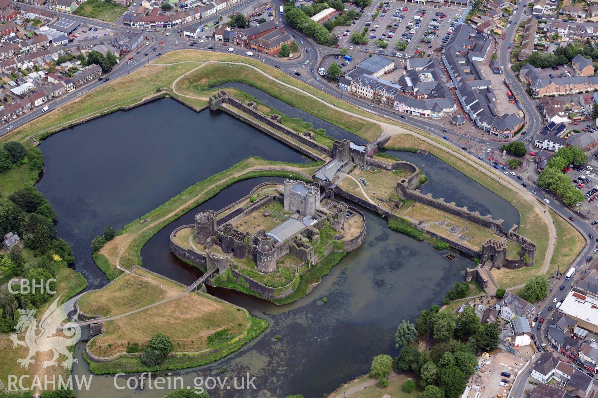 Aerial photograph of Caerphilly Castle. Oblique aerial photograph taken during the Royal Commission’s programme of archaeological aerial reconnaissance by Toby Driver on 26 June 2023