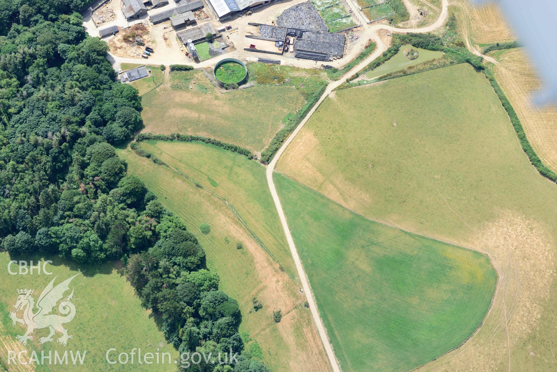 Garden at Nanhoron, including cropmarks of relict field systems. Oblique aerial photograph taken during the Royal Commission’s programme of archaeological aerial reconnaissance by Toby Driver on 10 July 2018.