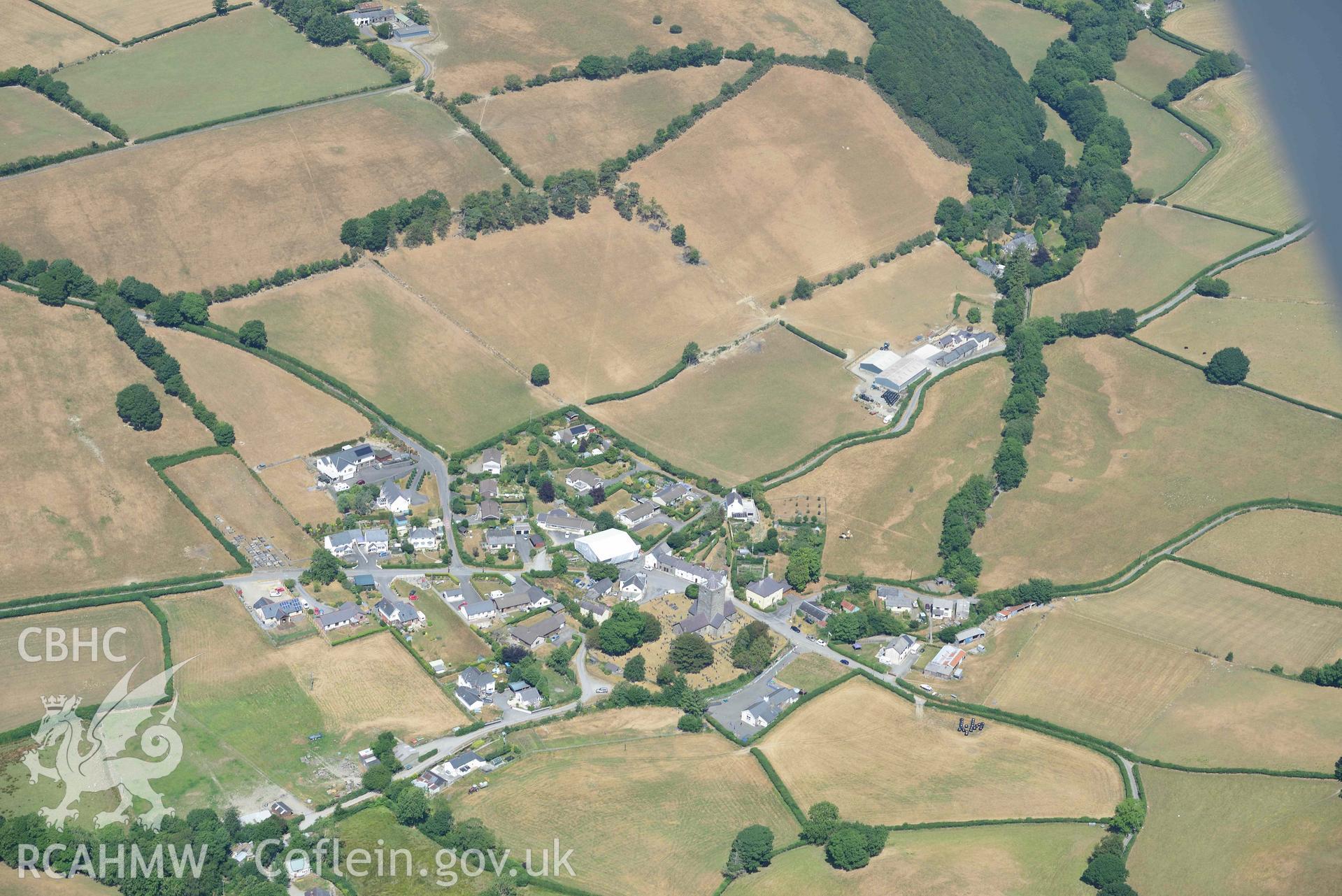 Llanfihangel y Creuddyn village. Oblique aerial photograph taken during the Royal Commission’s programme of archaeological aerial reconnaissance by Toby Driver on 10 July 2018.