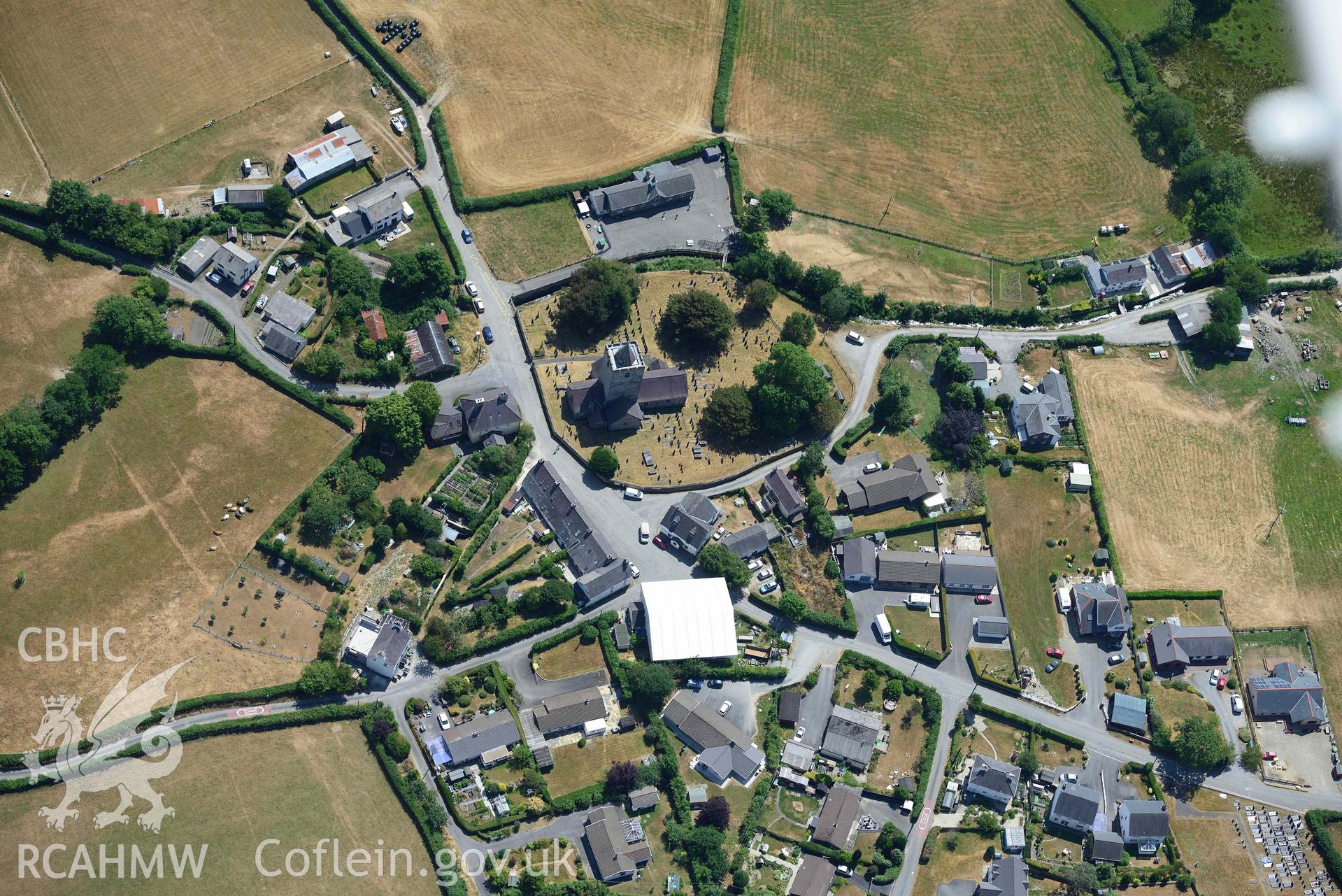 St Michael's Church, Llanfihangel y Creuddyn. Oblique aerial photograph taken during the Royal Commission’s programme of archaeological aerial reconnaissance by Toby Driver on 10 July 2018.