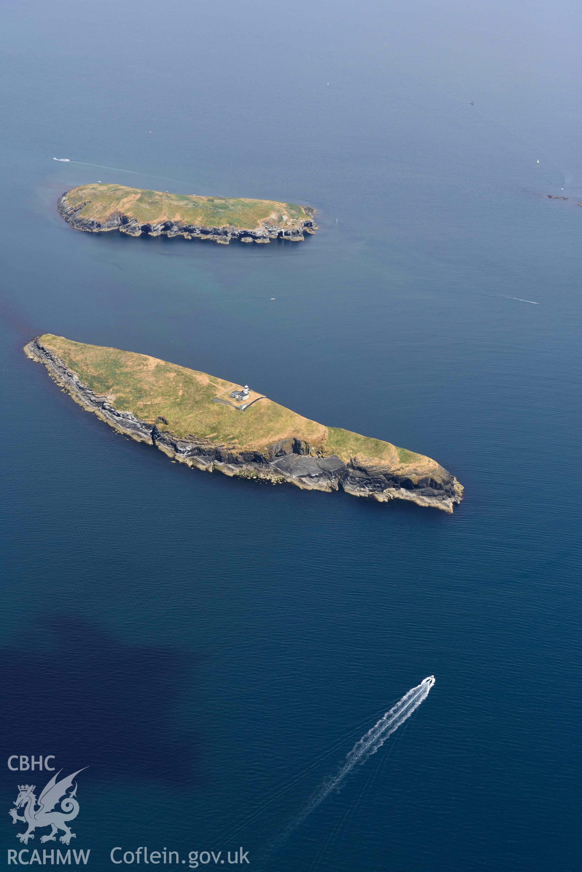 St Tudwals Island West (in foreground) and East. Oblique aerial photograph taken during the Royal Commission’s programme of archaeological aerial reconnaissance by Toby Driver on 10 July 2018.