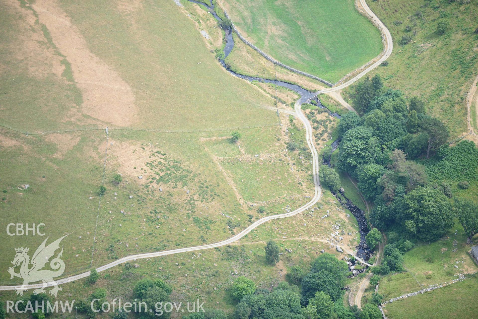 Llys Bradwen. Oblique aerial photograph showing detailed view, taken during the Royal Commission’s programme of archaeological aerial reconnaissance by Toby Driver on 10 July 2018.