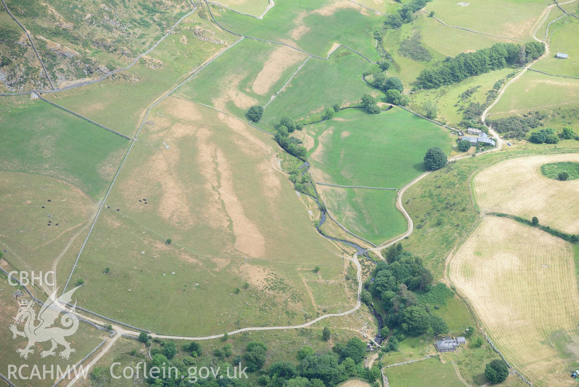 Llys Bradwen. Oblique aerial photograph taken during the Royal Commission’s programme of archaeological aerial reconnaissance by Toby Driver on 10 July 2018.