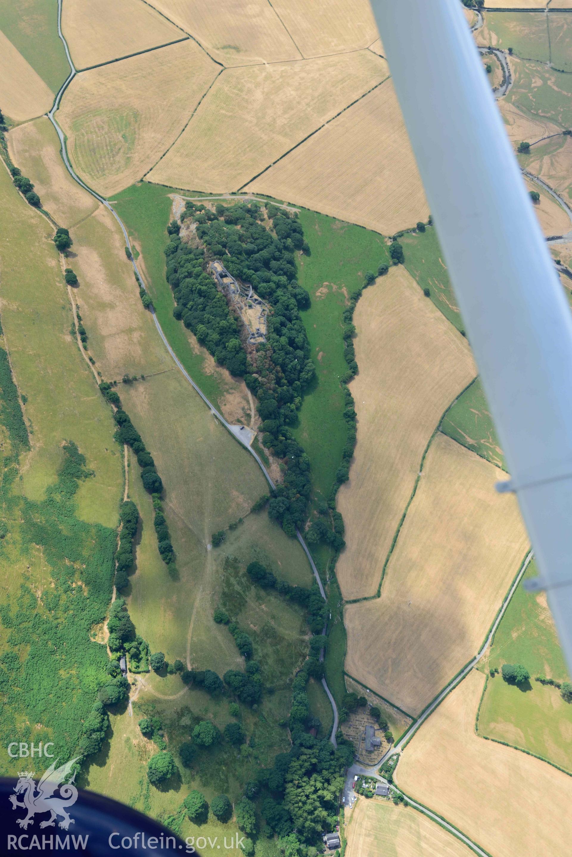 Castell y Bere and St Michael's Church, Llanfihangel-y-Pennant. Oblique aerial photograph taken during the Royal Commission’s programme of archaeological aerial reconnaissance by Toby Driver on 10 July 2018.