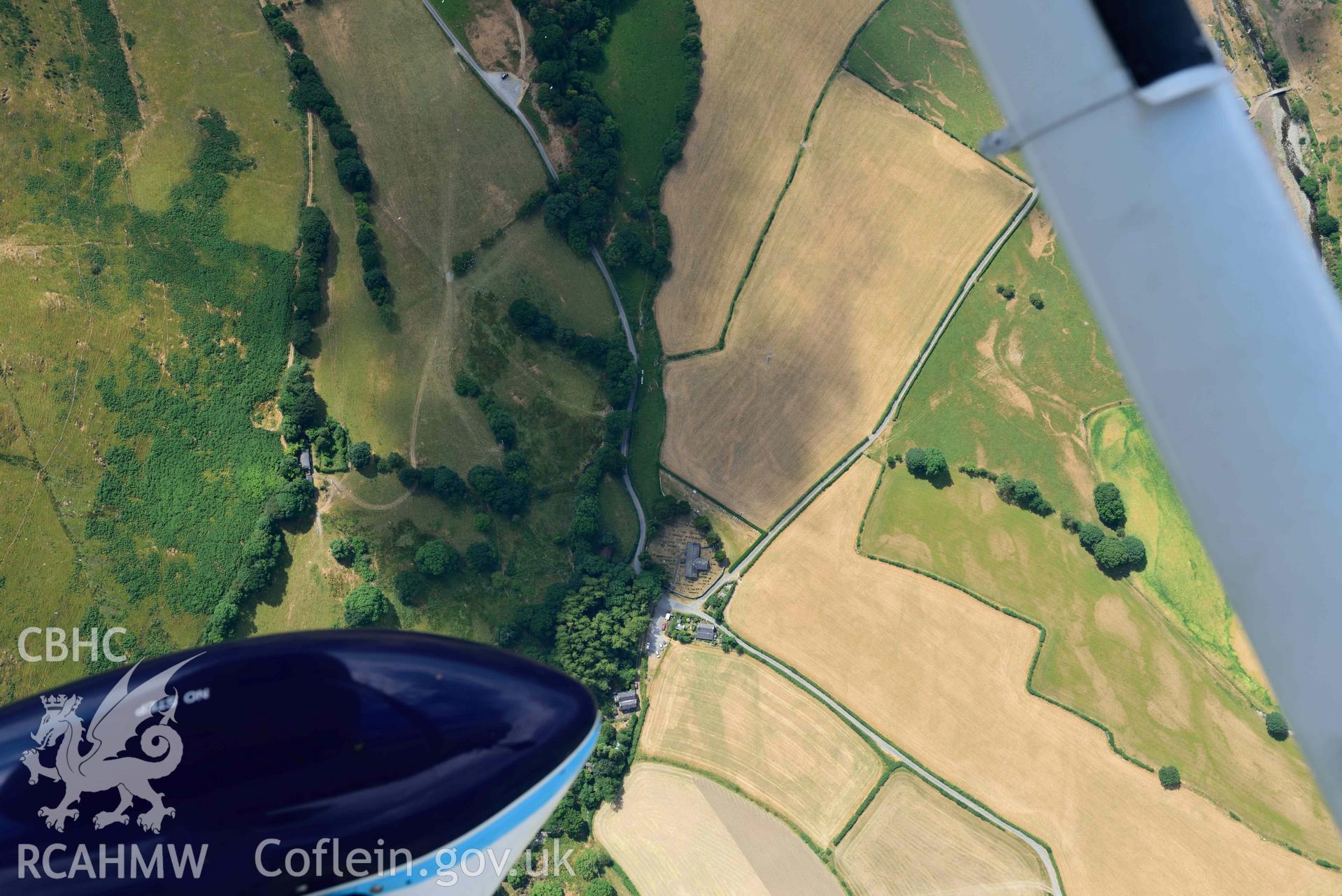 St Michael's Church, Llanfihangel-y-Pennant. Oblique aerial photograph taken during the Royal Commission’s programme of archaeological aerial reconnaissance by Toby Driver on 10 July 2018.