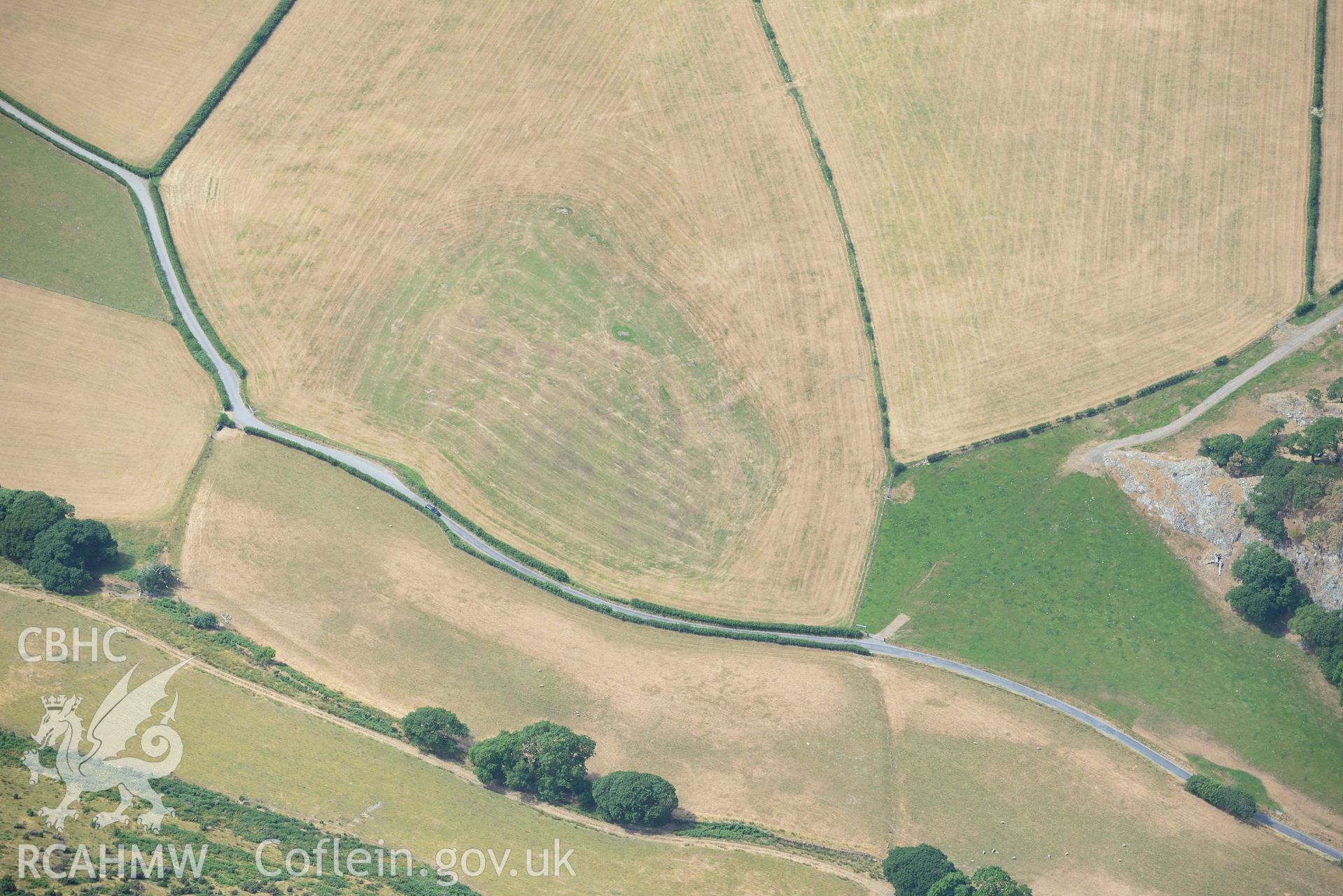 Possible cropmark near Castell y Bere. Oblique aerial photograph taken during the Royal Commission’s programme of archaeological aerial reconnaissance by Toby Driver on 10 July 2018.