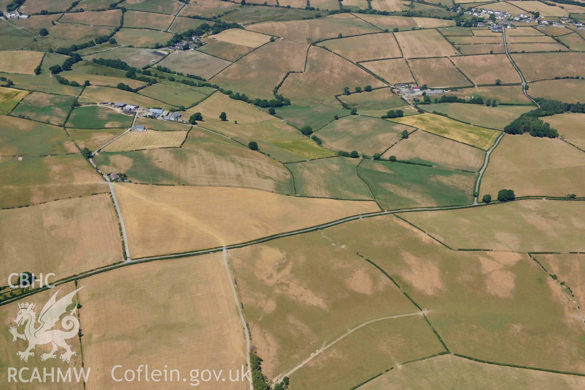 Brenan Roman Road and surrounding landscape. Oblique aerial photograph taken during the Royal Commission’s programme of archaeological aerial reconnaissance by Toby Driver on 10 July 2018.