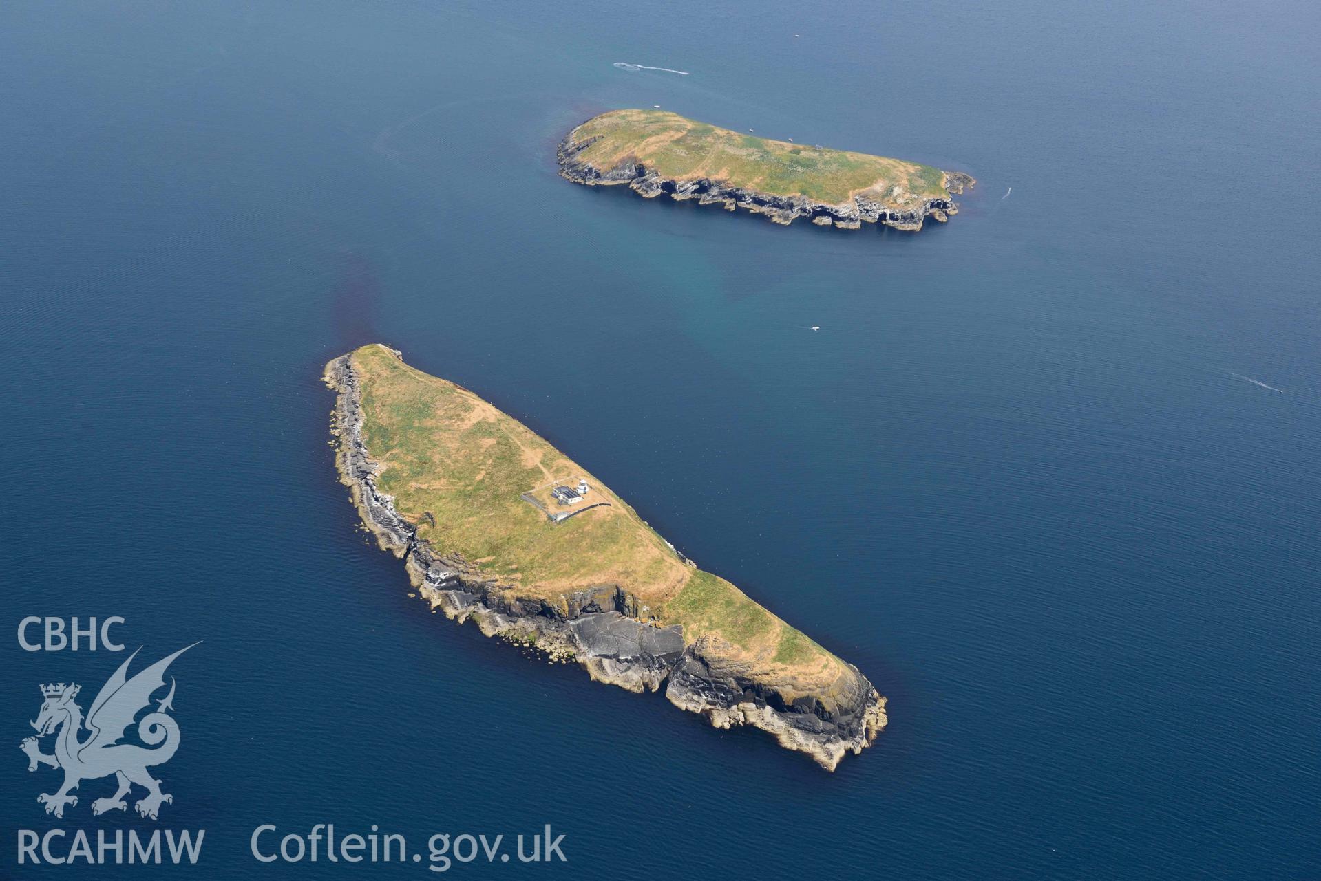 St Tudwals Lighthouse on  St Tudwals Island West, with St Tudwals Island East beyond. Oblique aerial photograph taken during the Royal Commission’s programme of archaeological aerial reconnaissance by Toby Driver on 10 July 2018.