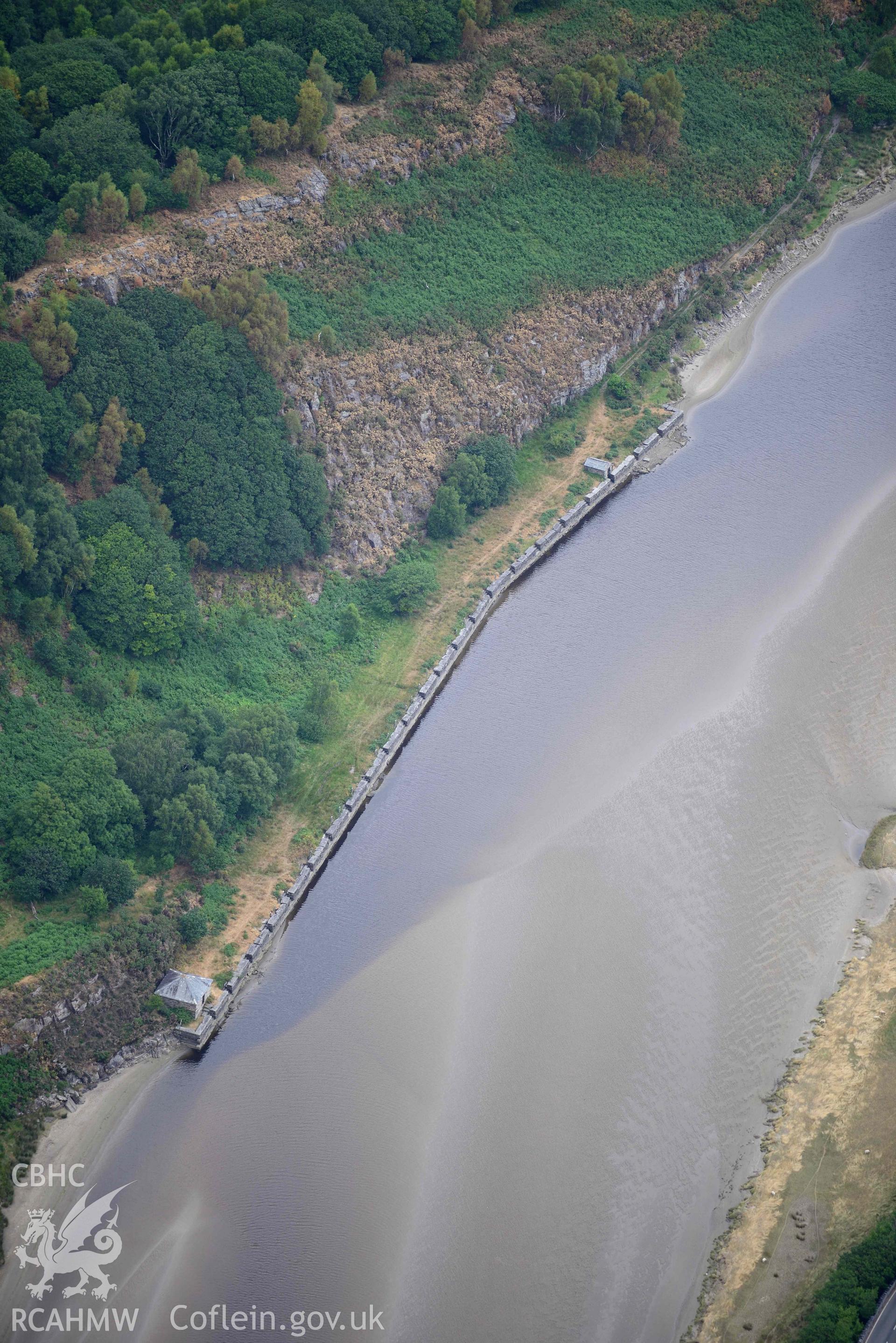 Close-up view of Tyddyn Isa slate quay. Oblique aerial photograph taken during the Royal Commission’s programme of archaeological aerial reconnaissance by Toby Driver on 10 July 2018.