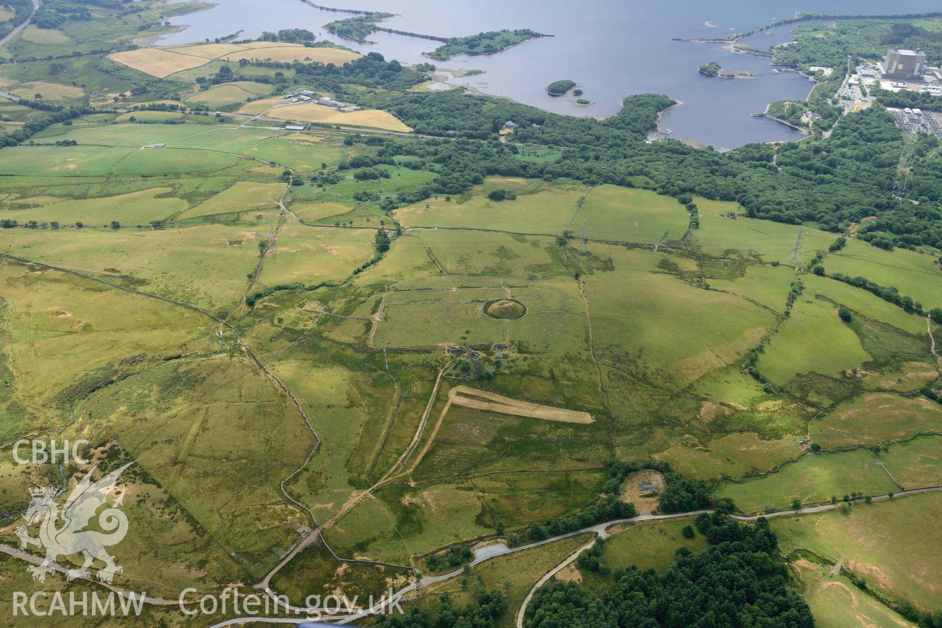 Tomen y Mur Roman Fort and surrounding landscape. Oblique aerial photograph taken during the Royal Commission’s programme of archaeological aerial reconnaissance by Toby Driver on 10 July 2018.