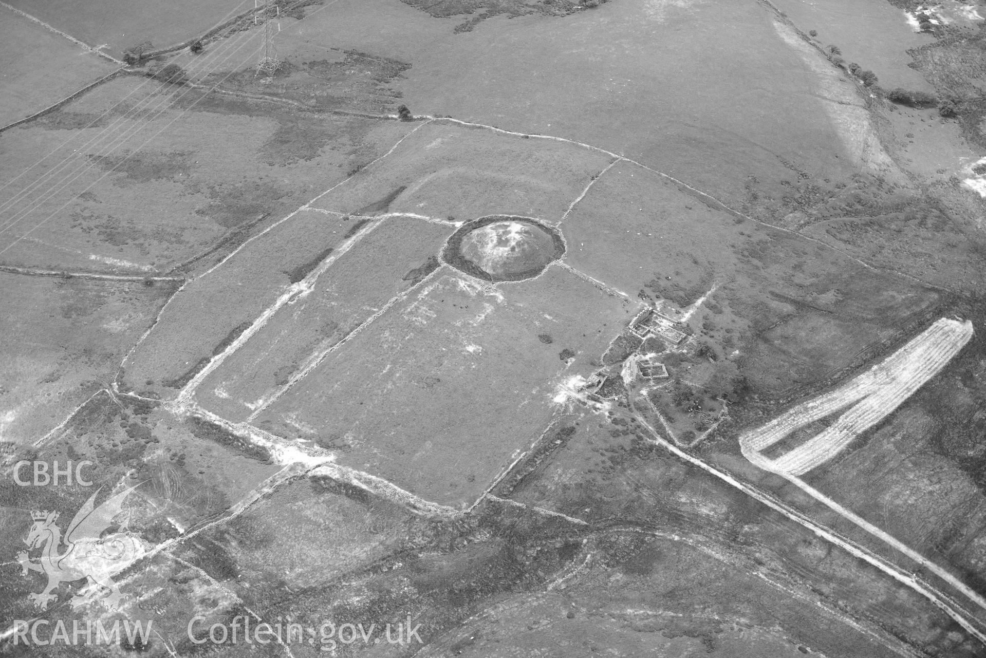 Close-up view of Tomen y Mur Roman Fort. Oblique black and white aerial photograph taken during the Royal Commission’s programme of archaeological aerial reconnaissance by Toby Driver on 10 July 2018.