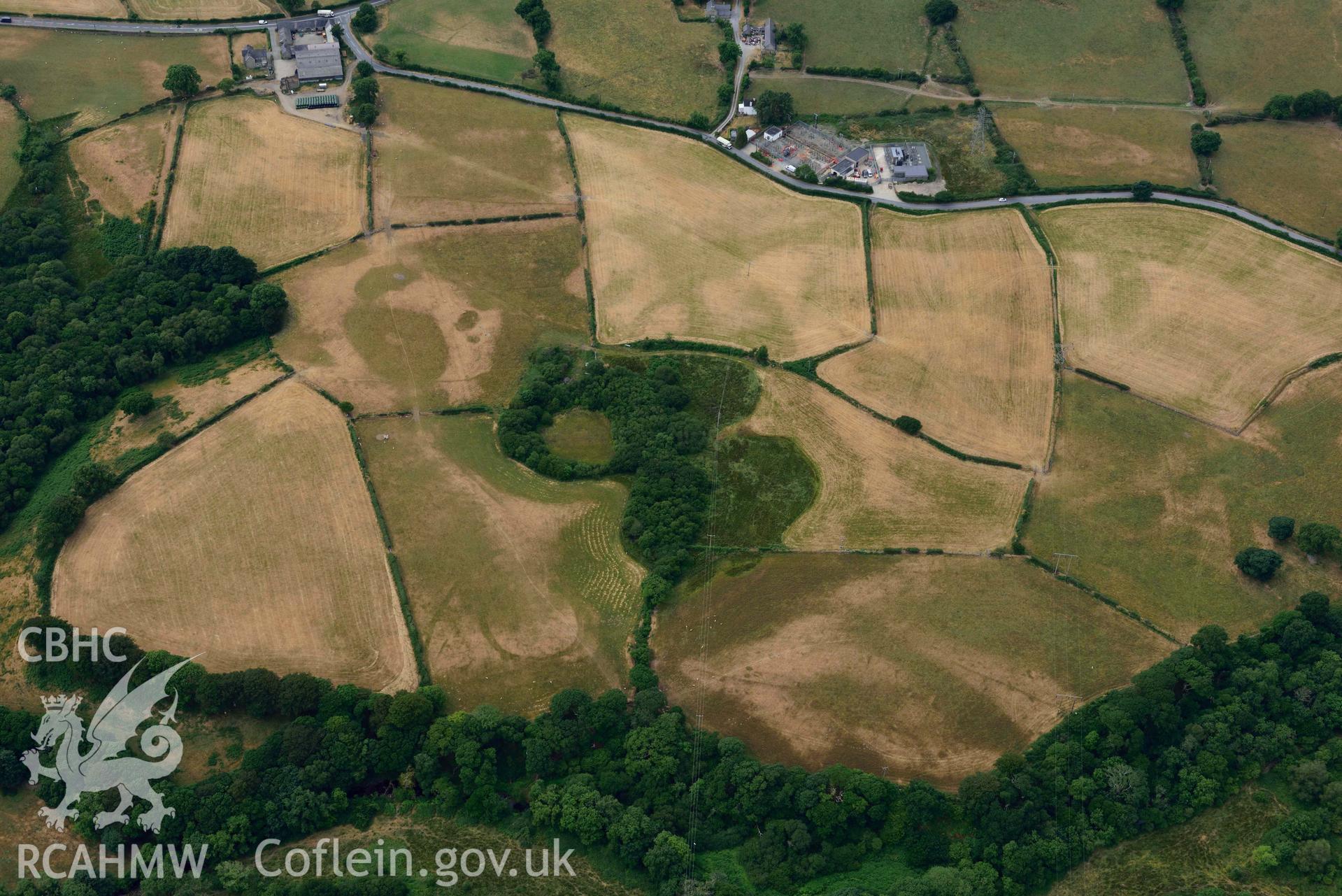 Detailed view of Bwlch y Ffordd Isa defended enclosure. Oblique aerial photograph taken during the Royal Commission’s programme of archaeological aerial reconnaissance by Toby Driver on 10 July 2018.