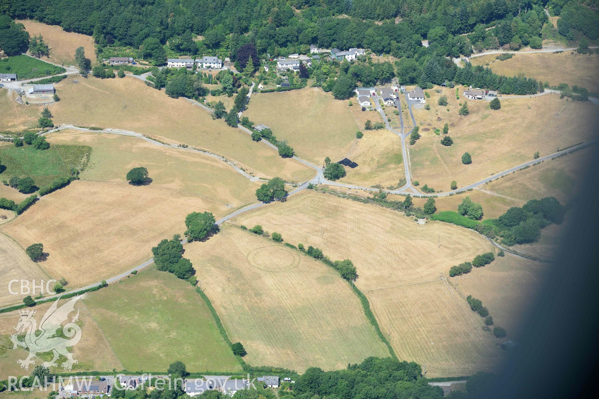 Detailed view of Pen y Wal Dollwen barrow and Dollwen barrow. Oblique aerial photograph taken during the Royal Commission’s programme of archaeological aerial reconnaissance by Toby Driver on 10 July 2018.