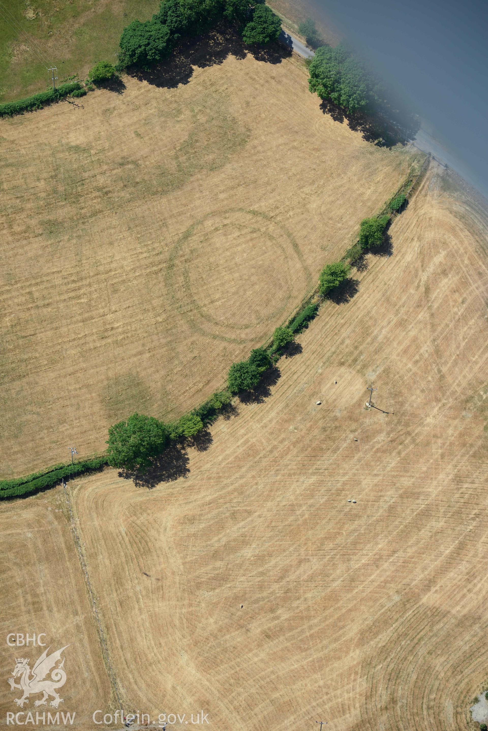 Detailed view of Pen y Wal Dollwen barrow and Dollwen barrow. Oblique aerial photograph taken during the Royal Commission’s programme of archaeological aerial reconnaissance by Toby Driver on 10 July 2018.