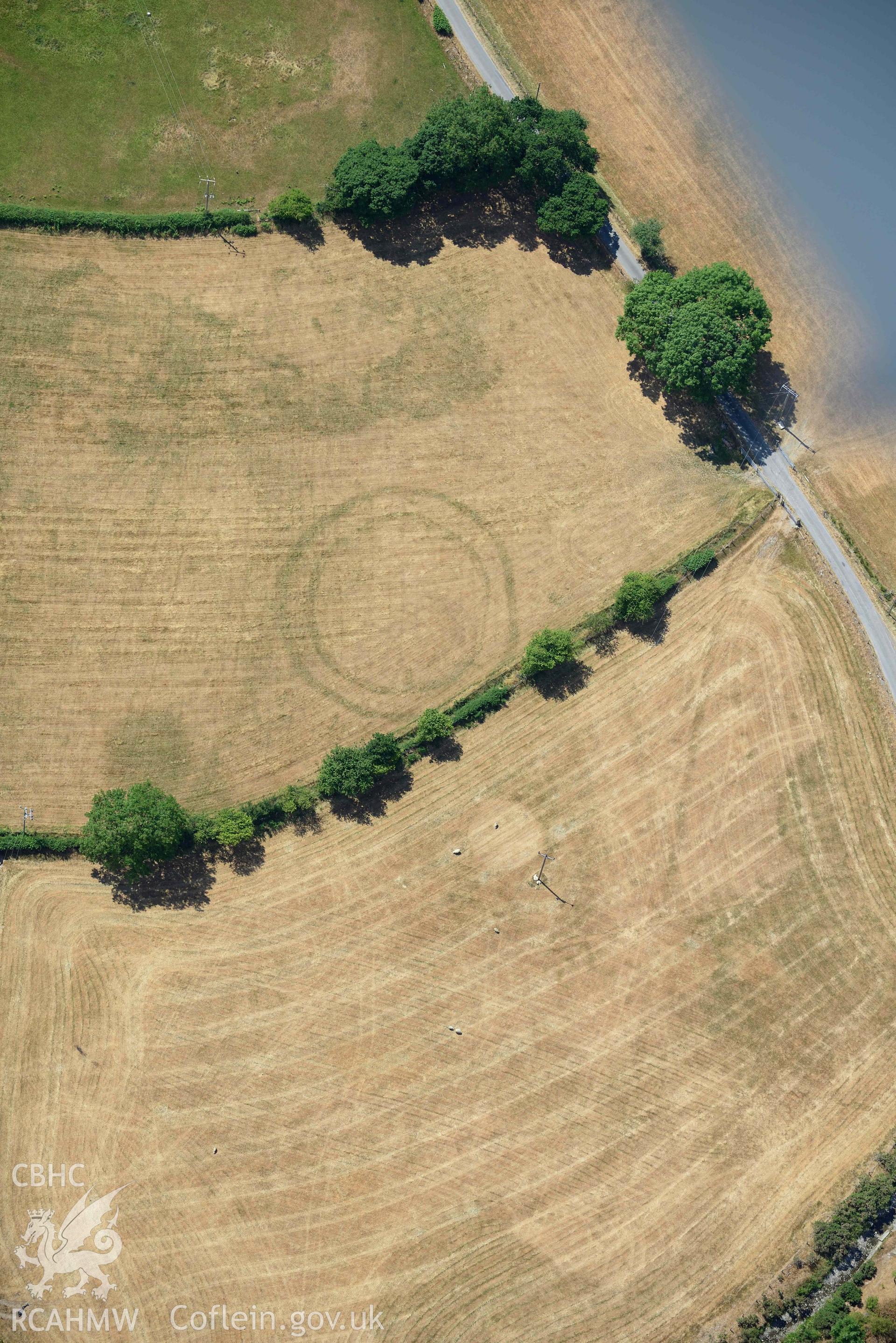 Detailed view of Pen y Wal Dollwen barrow and Dollwen barrow. Oblique aerial photograph taken during the Royal Commission’s programme of archaeological aerial reconnaissance by Toby Driver on 10 July 2018.