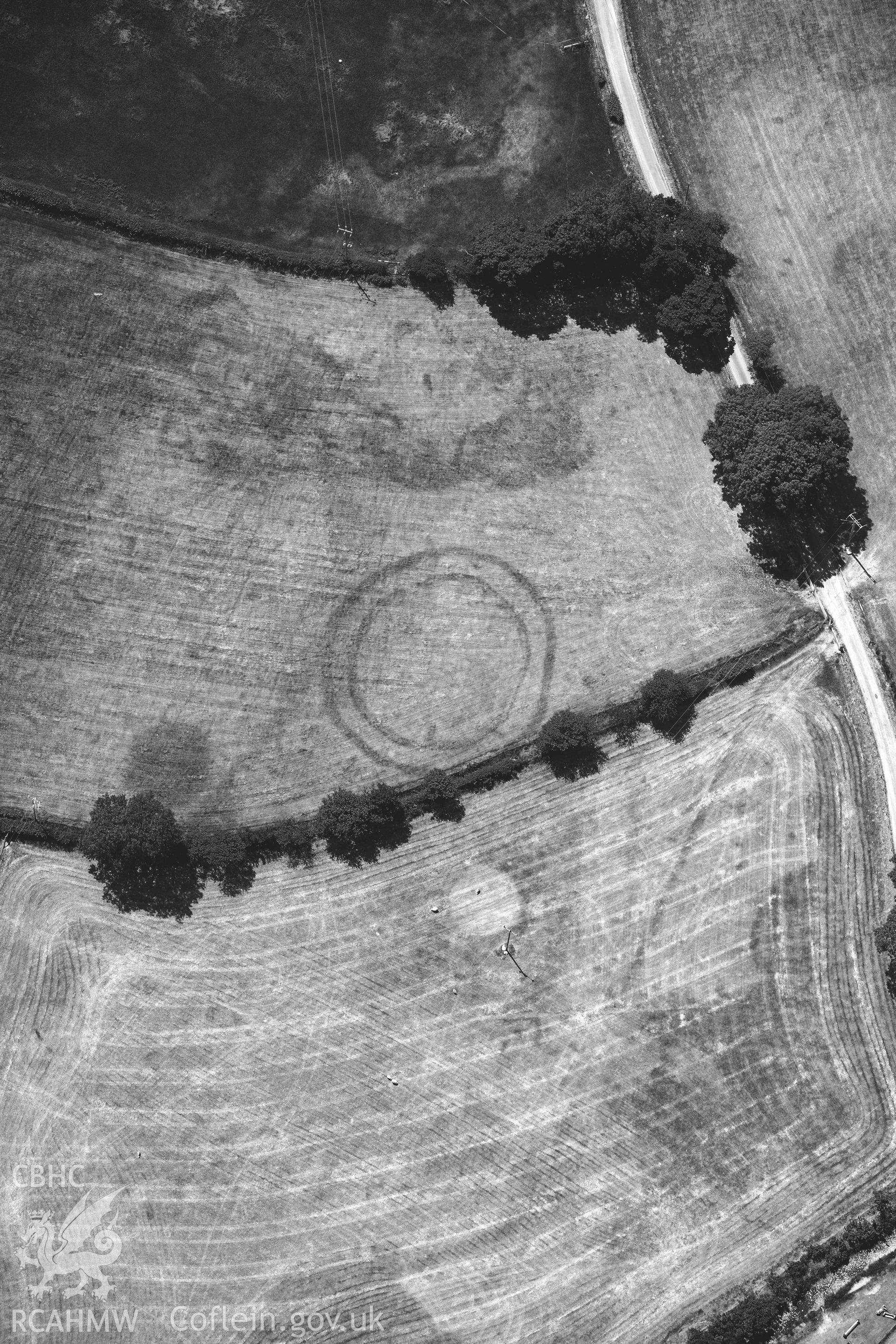 Detailed view of Pen y Wal Dollwen barrow and Dollwen barrow. Oblique aerial photograph taken during the Royal Commission’s programme of archaeological aerial reconnaissance by Toby Driver on 10 July 2018.