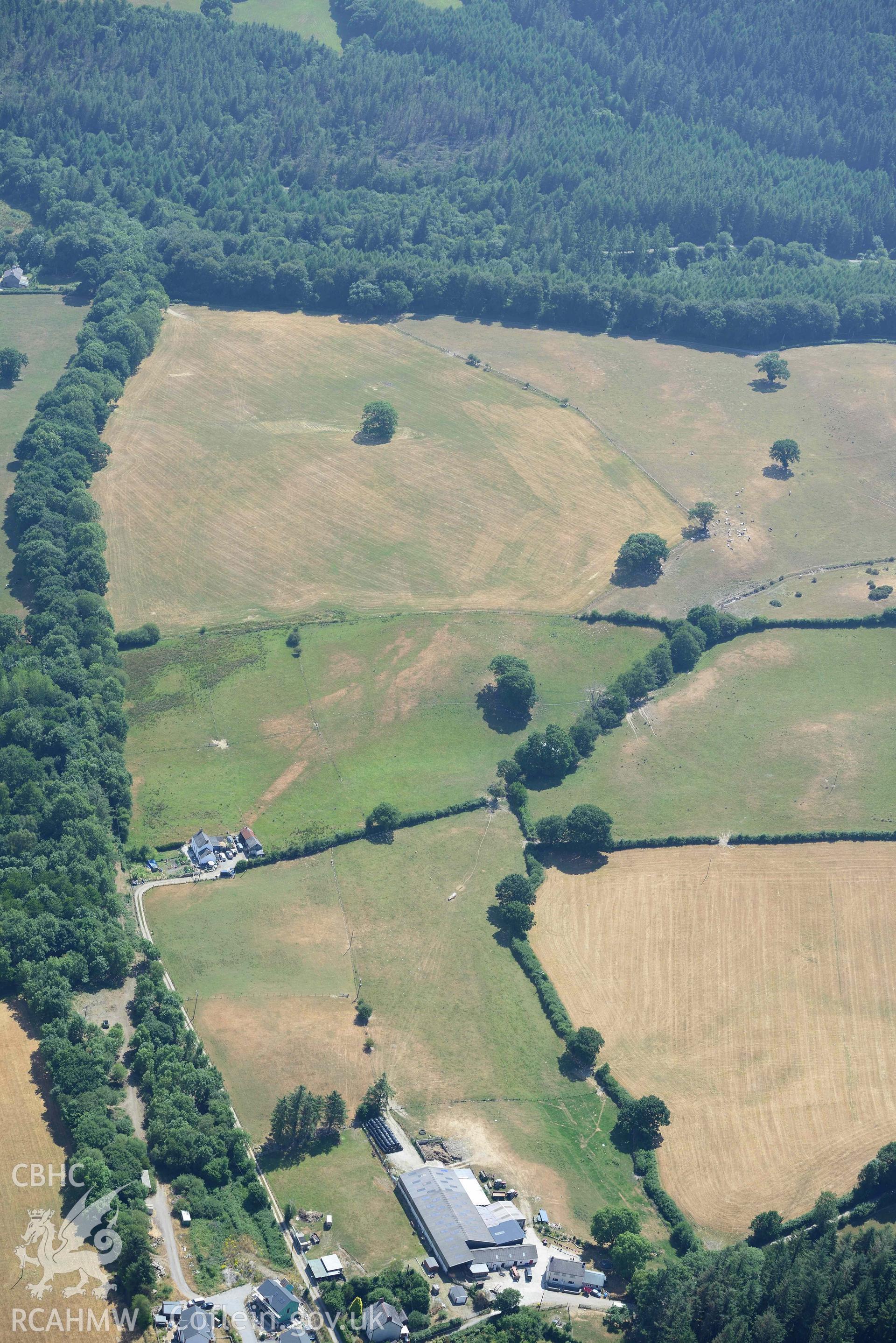 Sarn Helen at Hendre Villa. Oblique aerial photograph taken during the Royal Commission’s programme of archaeological aerial reconnaissance by Toby Driver on 10 July 2018.